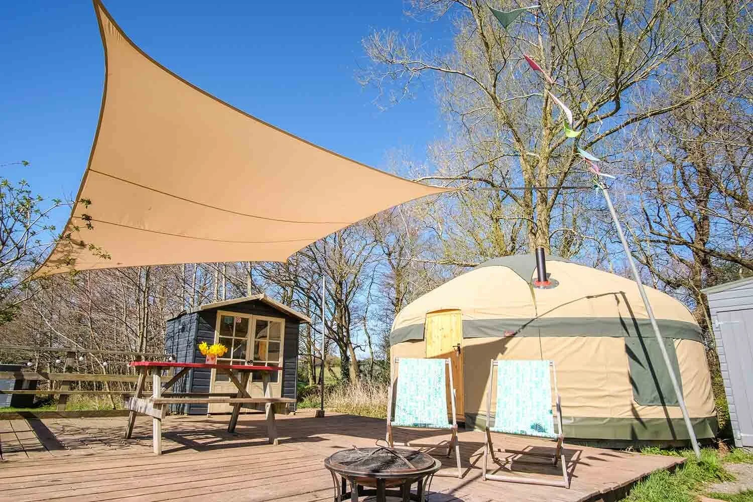 Canvas-yurt-and-sundeck-at-Wye-Glamping-for-couples-in-Wales.webp