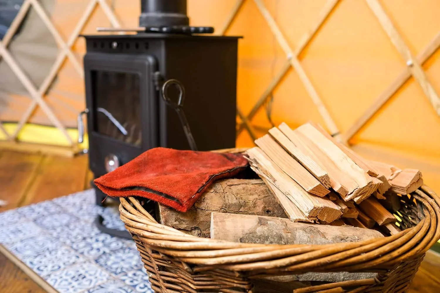 Cosy-up-to-your-own-wood-burning-stove-at-Wye-Glamping.webp