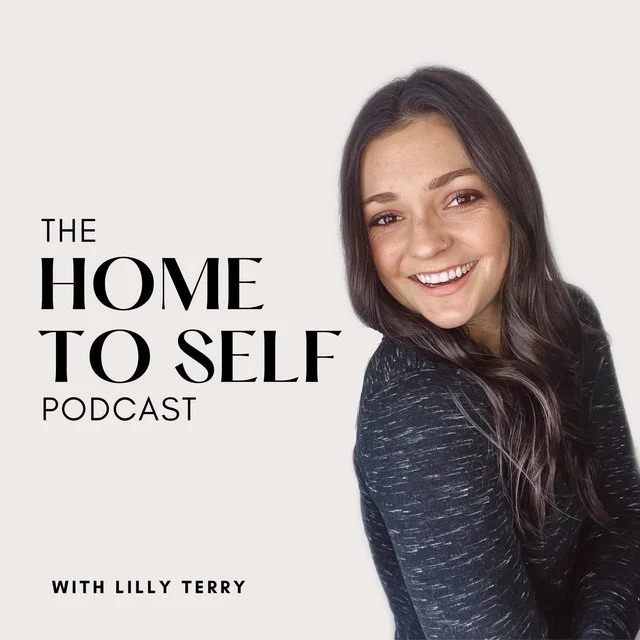 Podcast cover featuring a smiling woman with long dark hair, wearing a black top, alongside text that reads 'The Home to Self Podcast with Lilly Terry' on a light background.
