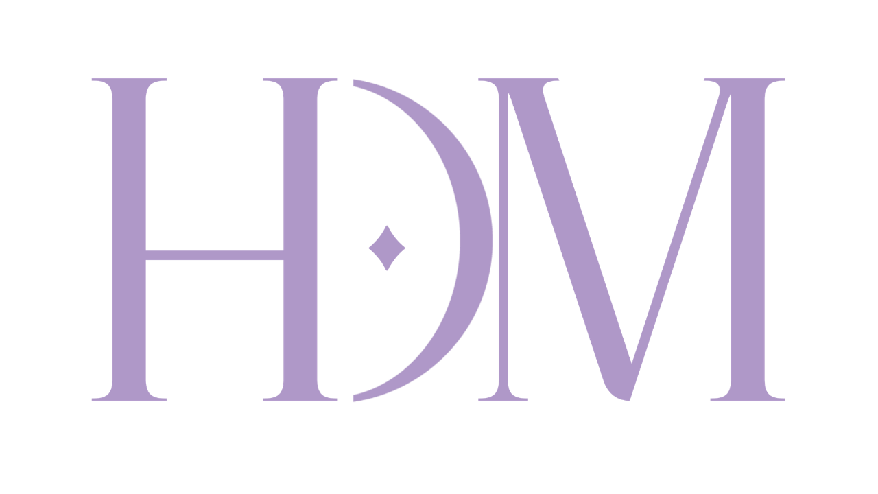Stylized logo with the letters H, D, and M in light purple with a small diamond shape in the center.