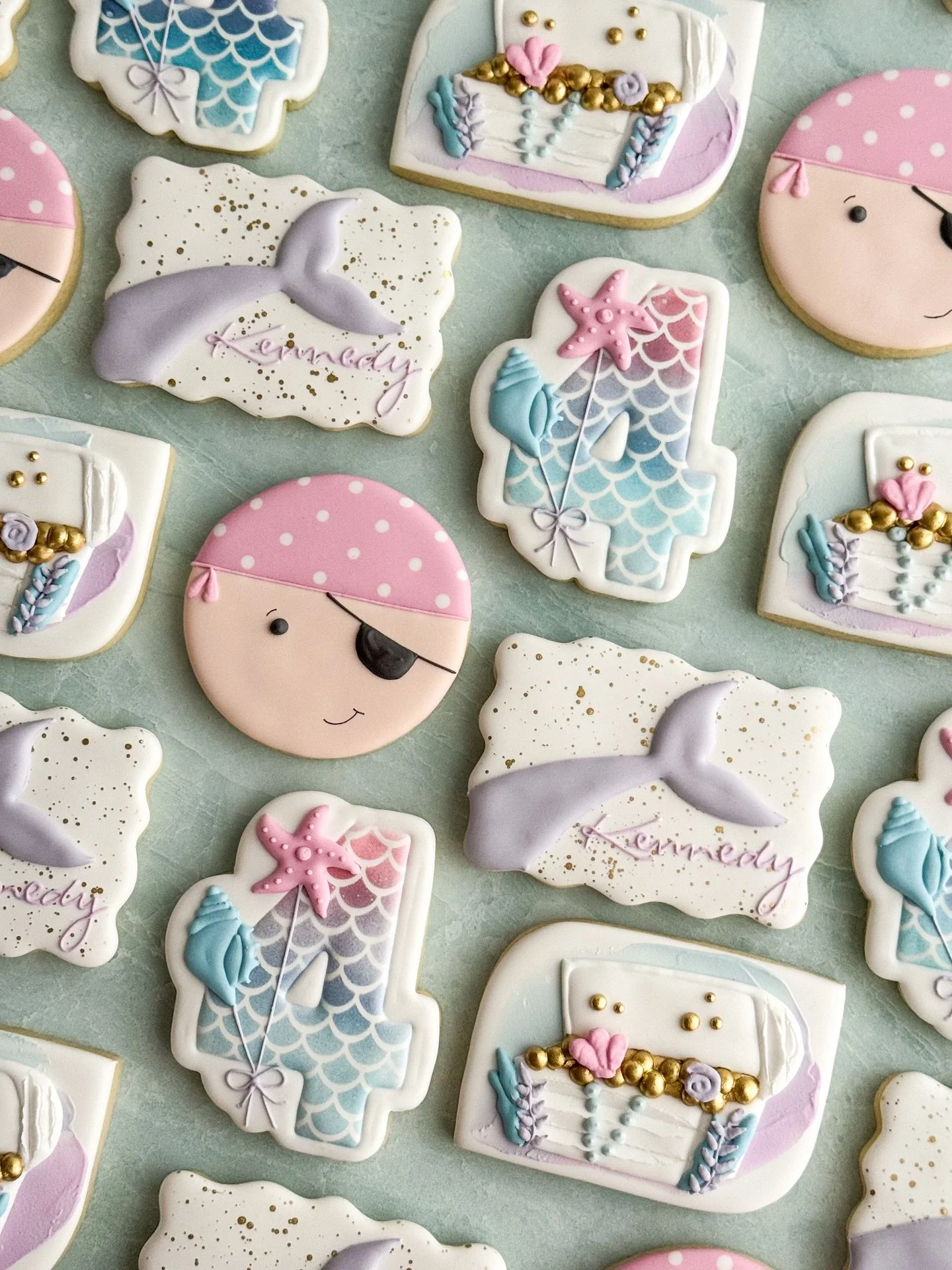 The best part of creating for kids birthdays is getting to see the themes they come up with as they get older! 

Mermaids and pirates in pinks, purples, and blues, emphasis on the mermaids. I LIVE for the specificity! 

#sugarcookies #decoratedsugarc