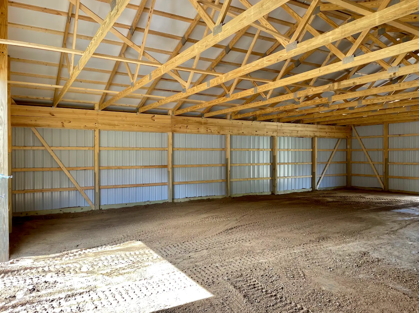 Interior of a pole barn with dirt floors