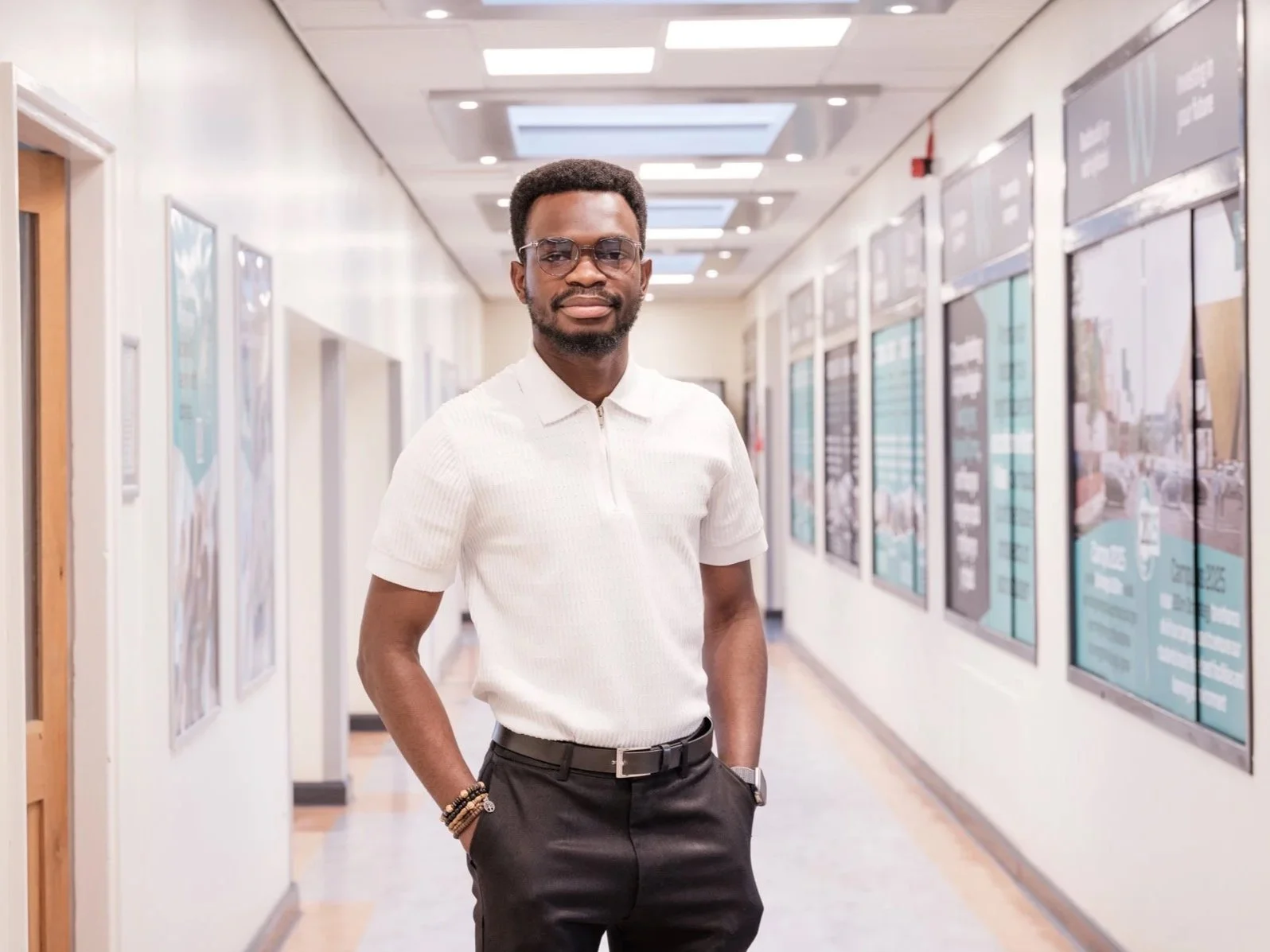 Environmental workplace portrait of male student at wrexham university