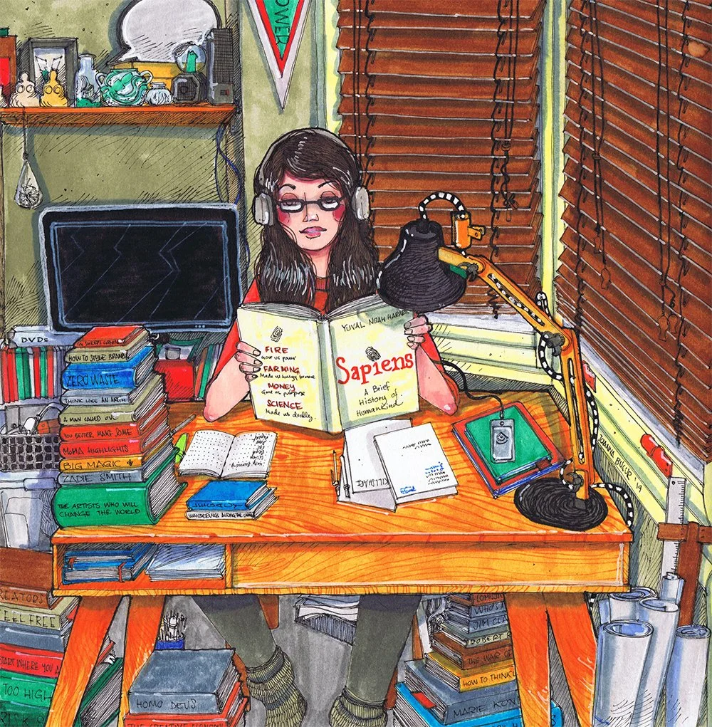 Illustration of a woman with long dark hair and glasses reading a book titled 'Sapiens' at her cluttered desk inside a room with books, closed wooden blinds, and various decorations.