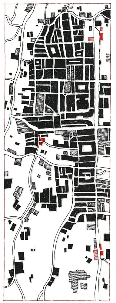 A black and white map with a vertical layout, showing roads and buildings in a grid pattern, with a few areas shaded in red and gray, and natural features like trees and hills.
