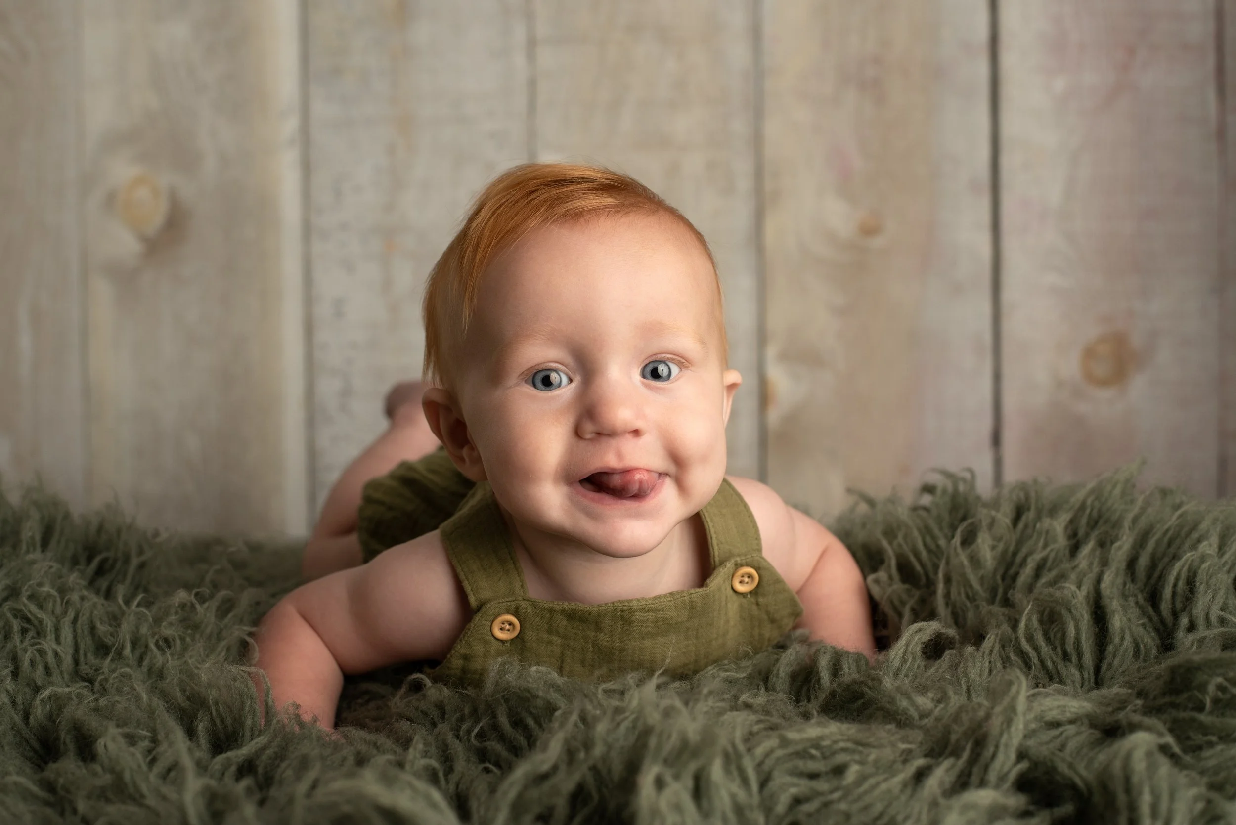 6 months is one of my favourite ages; they're often so smiley (and not yet totally making strange) PLUS it happens to be around the time they discover their feet and eat them. And for whatever reason, I think this is the ABSOLUTE cutest thing! 

This