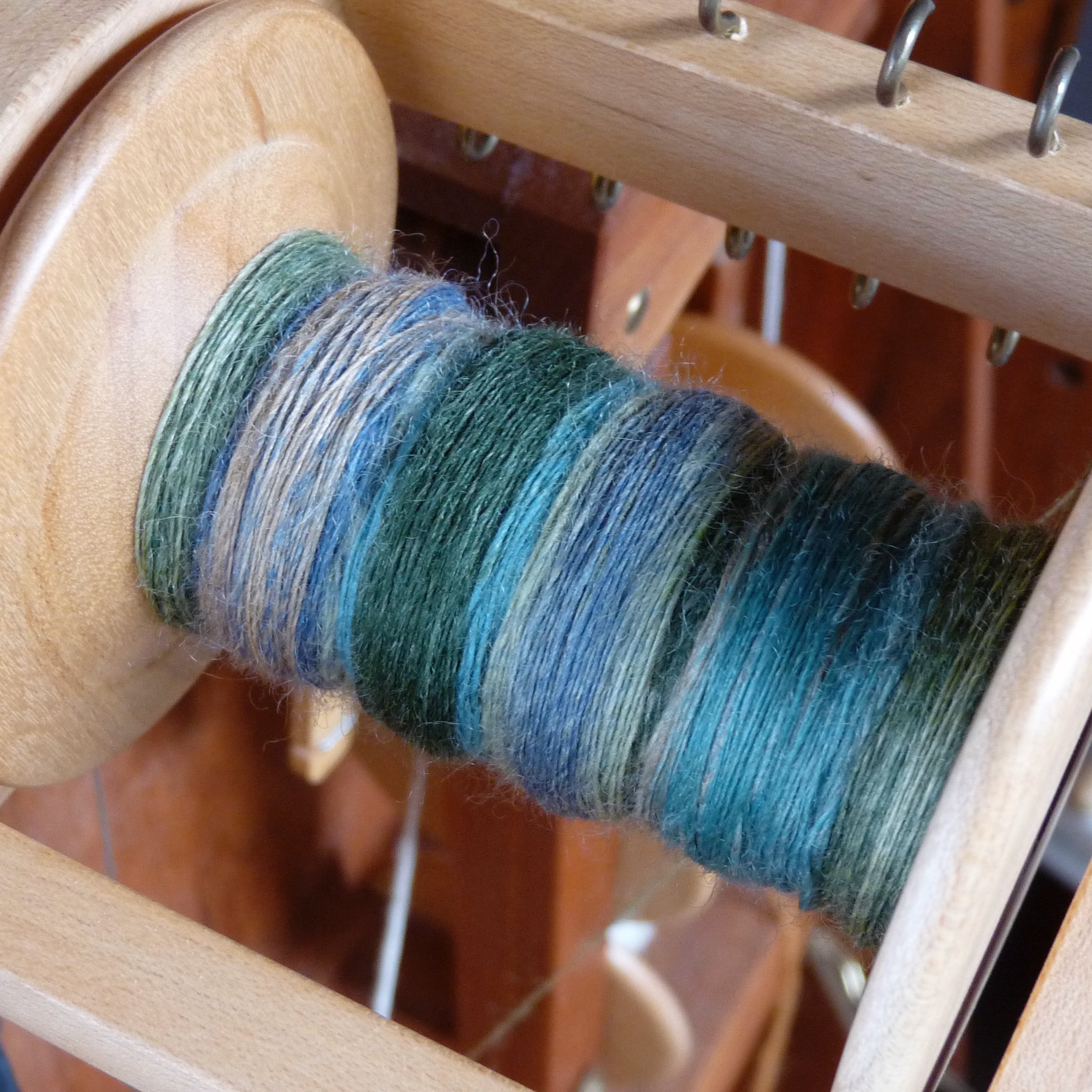 Handspun yarn on the spinning wheel