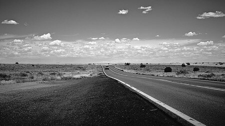 &ldquo;There was nowhere to go but everywhere, so just keep on rolling under the stars.&rdquo;
― Jack Kerouac, On the Road: the Original Scroll

Photo1

A desolate road somewhere in Arizona. These wide open spaces littered with sage brush are a stark