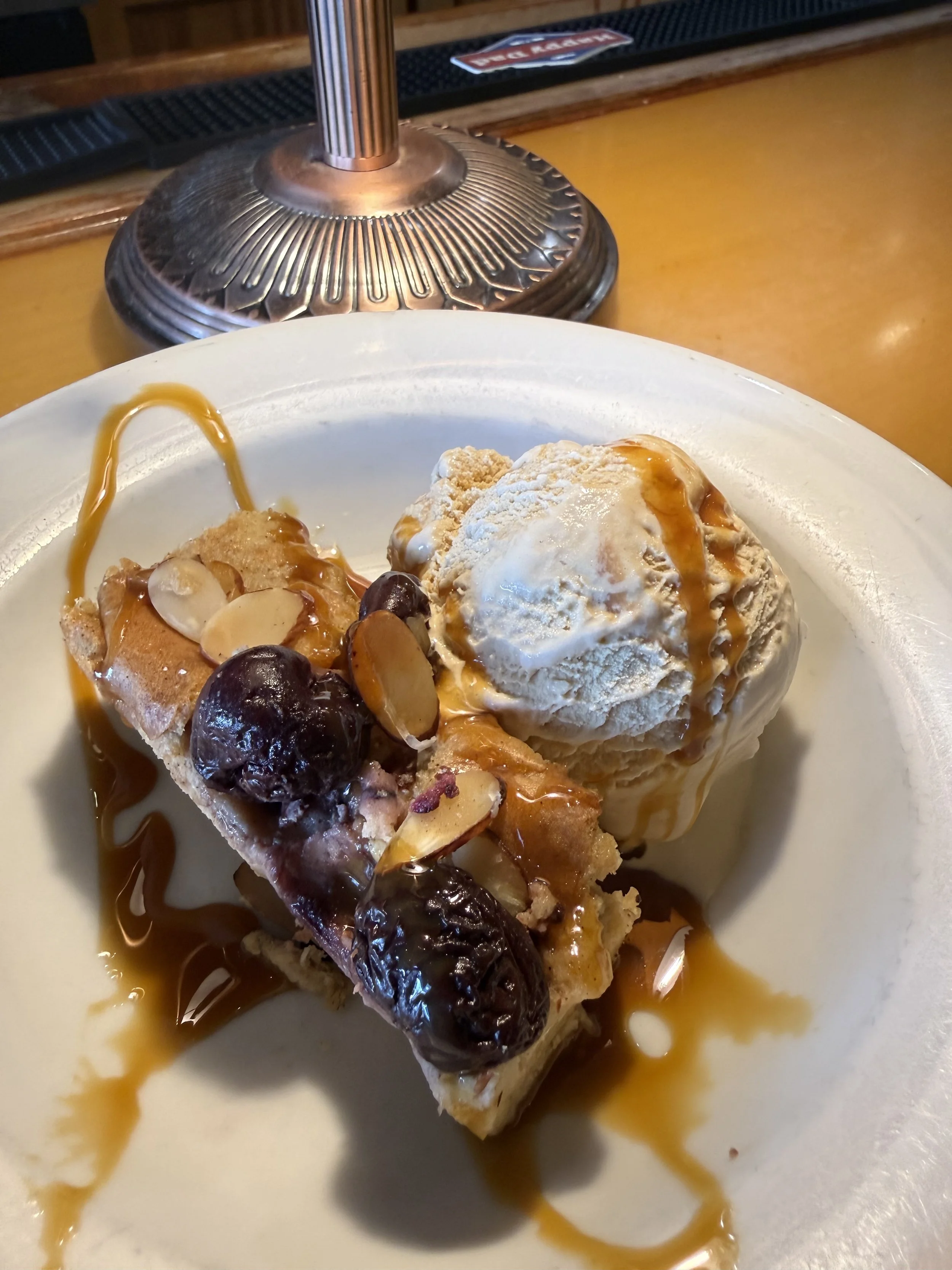 toasted almond and cherry bread pudding with seasalt and carmel ice cream