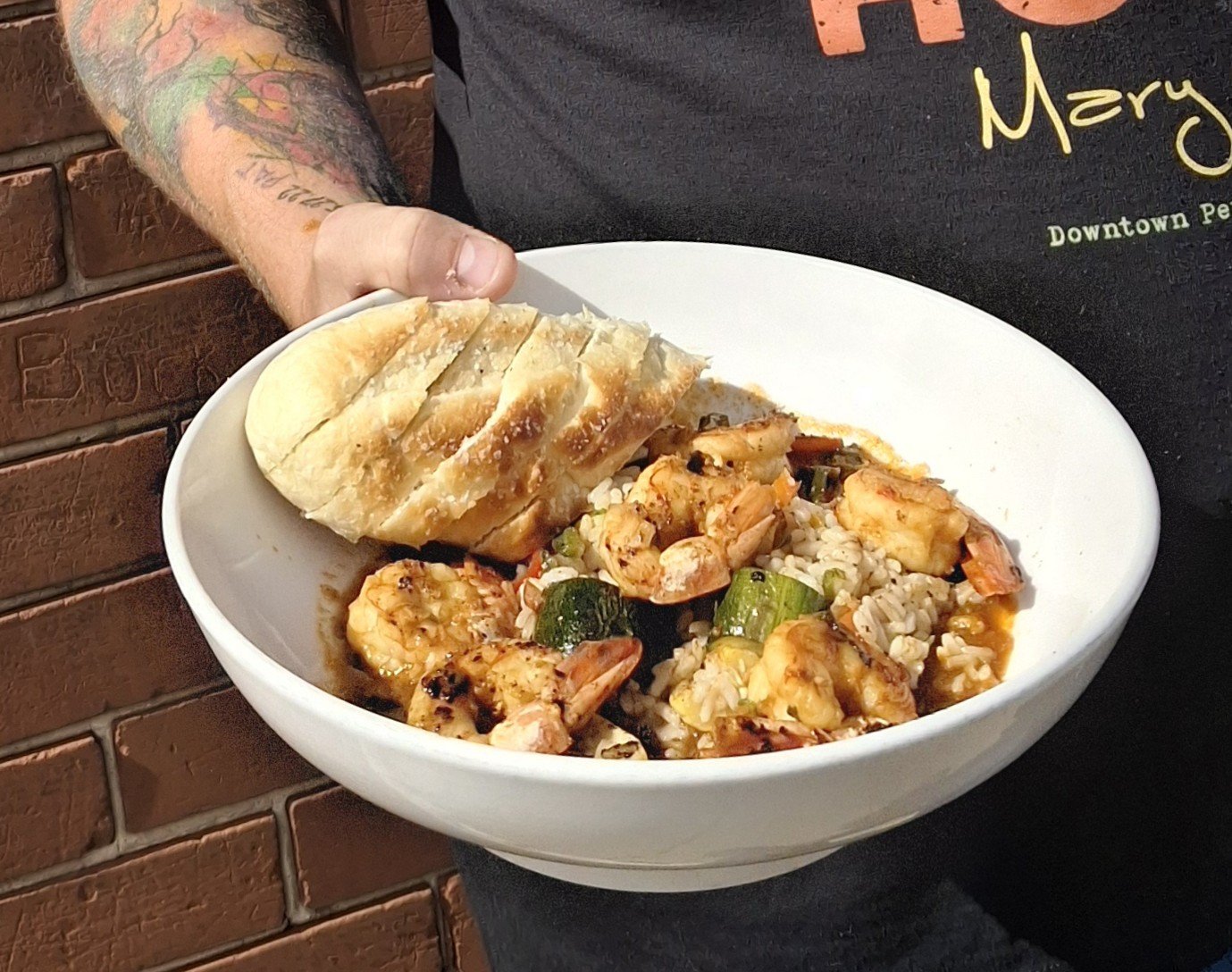 Feature Entree:
Bacon Jam Shrimp Curry -
A bed of savory dirty rice layered with slow-roasted summer squash and caramelized red onions, finished with tender shrimp bathed in a rich red curry sauce and kissed with a touch of bacon jam.
A True Flavor