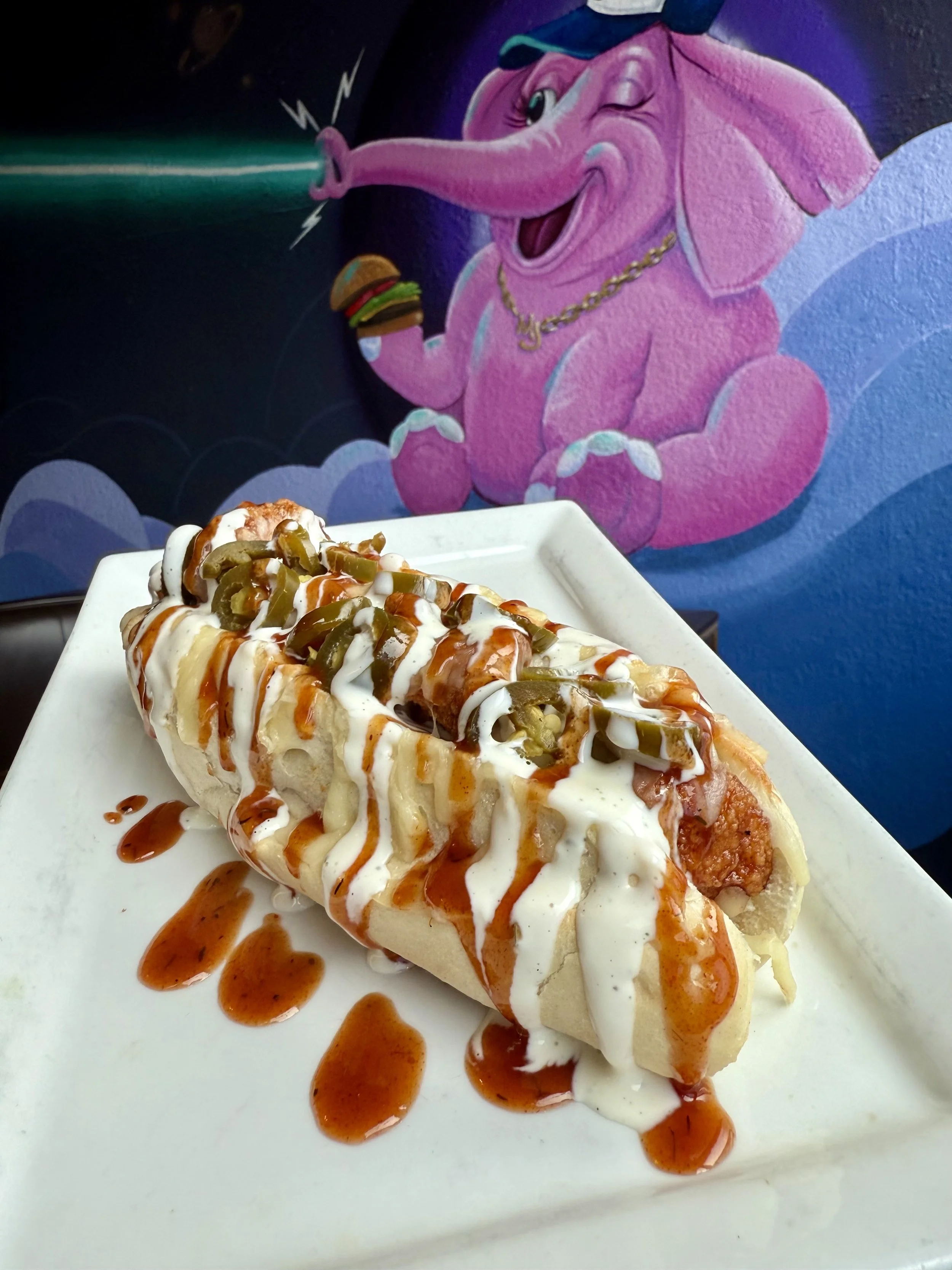 The Crazy Train - Fried BBQ Chicken bites, provel, pickled jalapenos, bbq & ranch drizzle