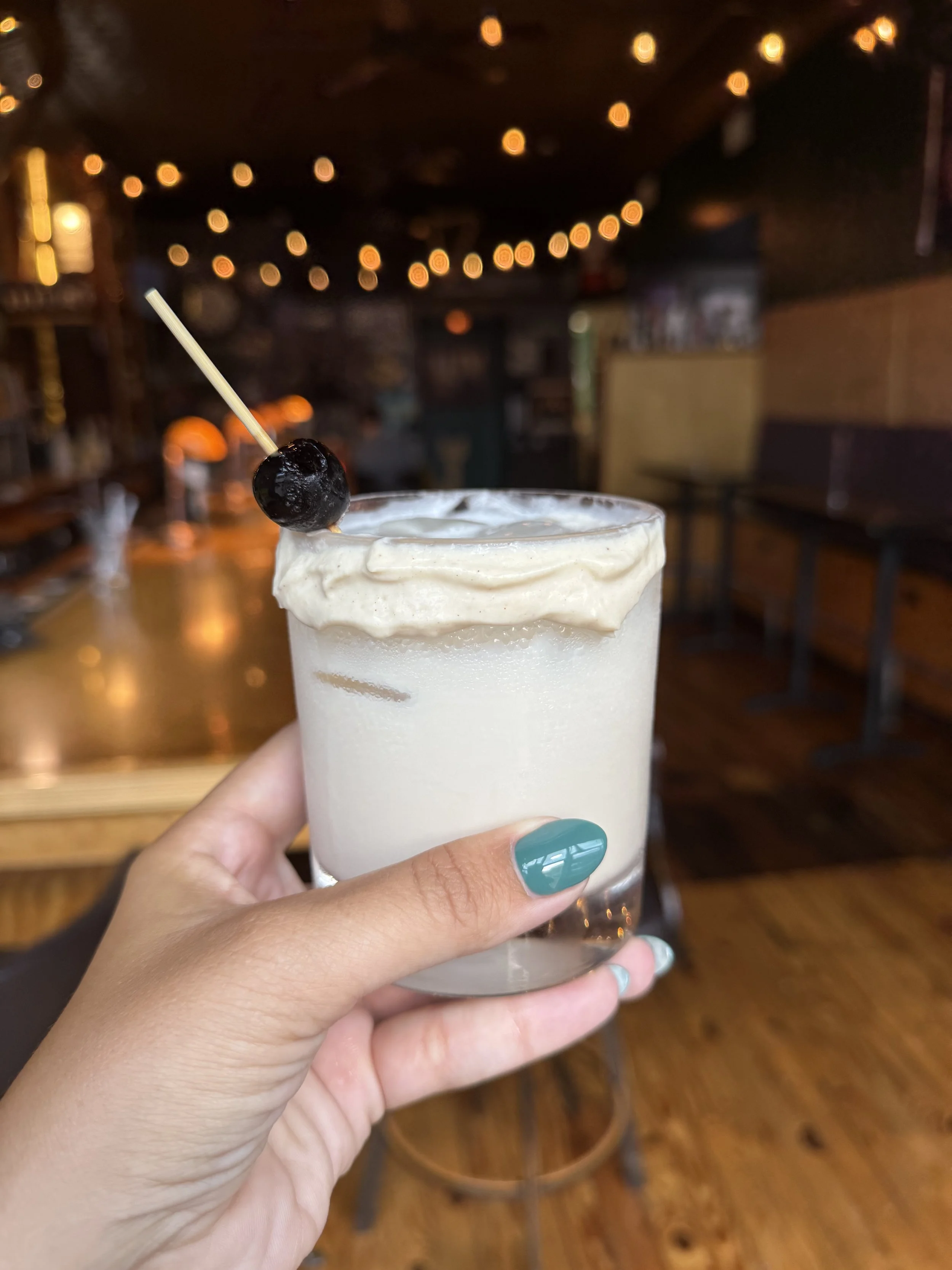 Hard truth Peanut butter whiskey, gooey butter cake cream, Kahlua, topped with milk, served with a bourbon cream rim and a cherry