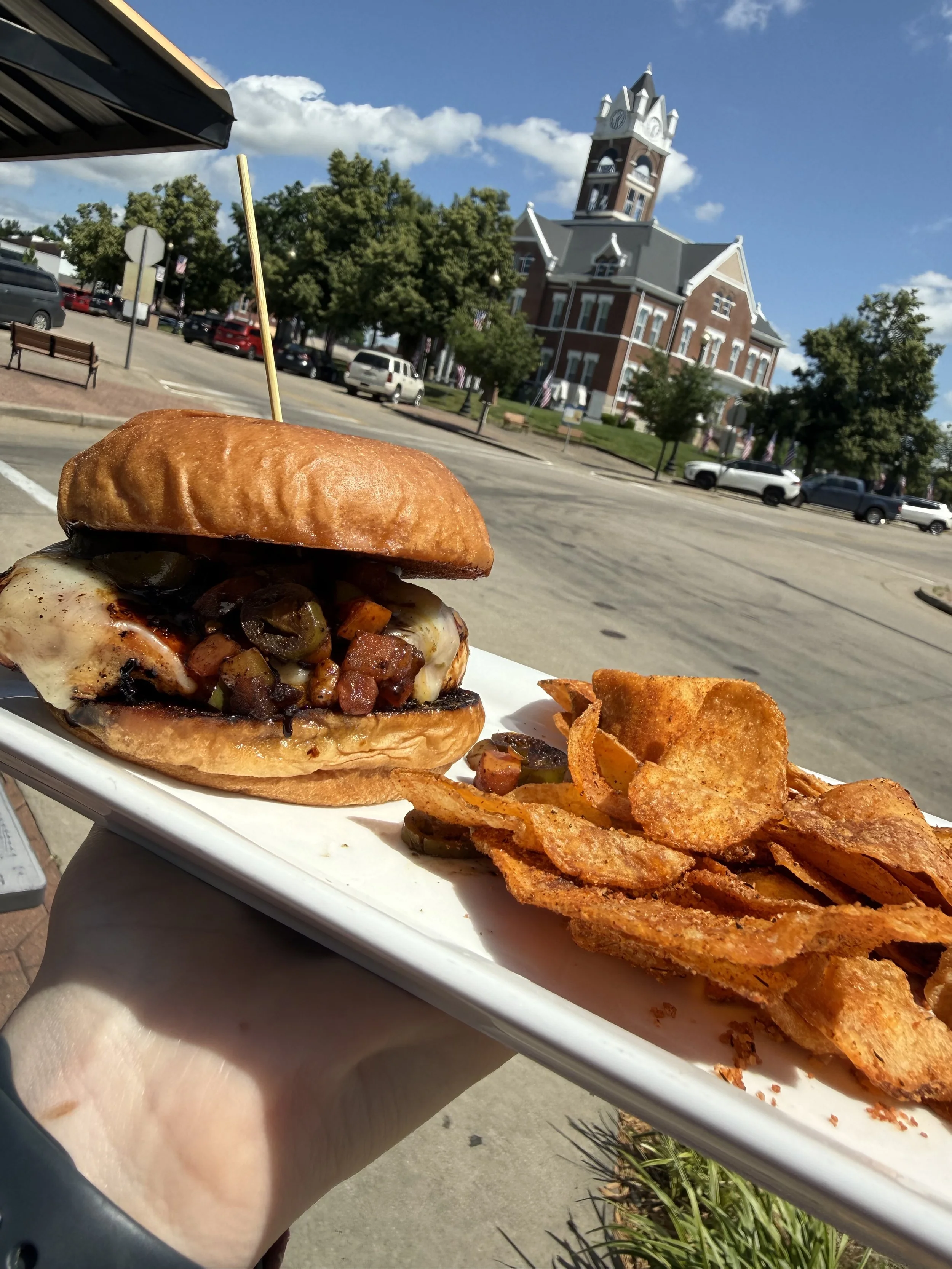 Feature Sammy: 
Chicken breast grilled in soy sauce & honey topped with pepper jack cheese, shredded cheddar jack cheese and sauteed jalapenos and pico loaded on a Hawaiian bun