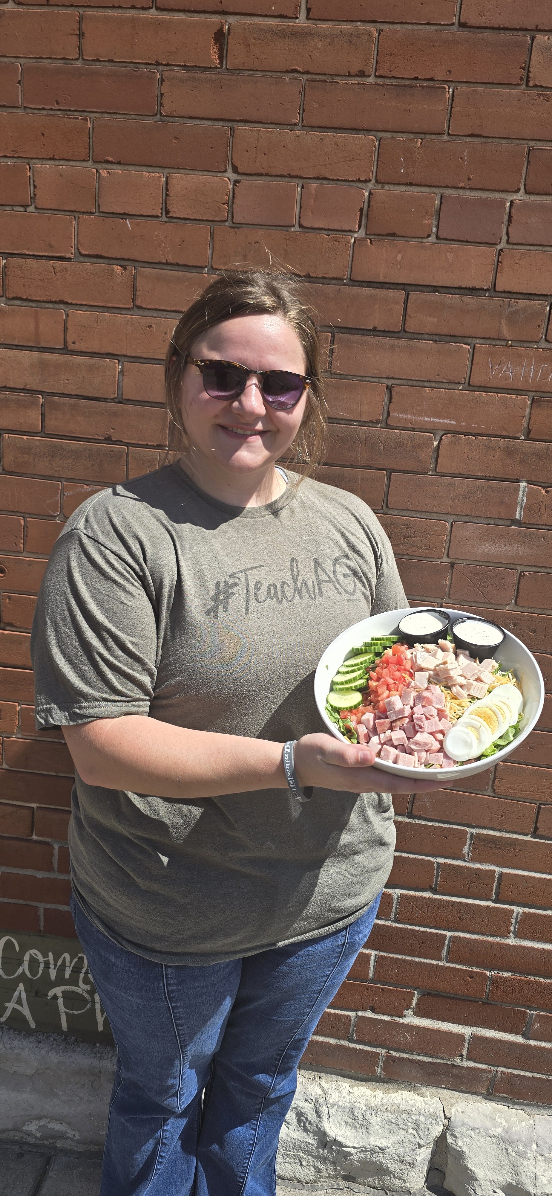 Chef salad, romaine lettuce, cheddar jack cheese, ham, turkey, diced tomatoes, English cucumber, boiled egg.
