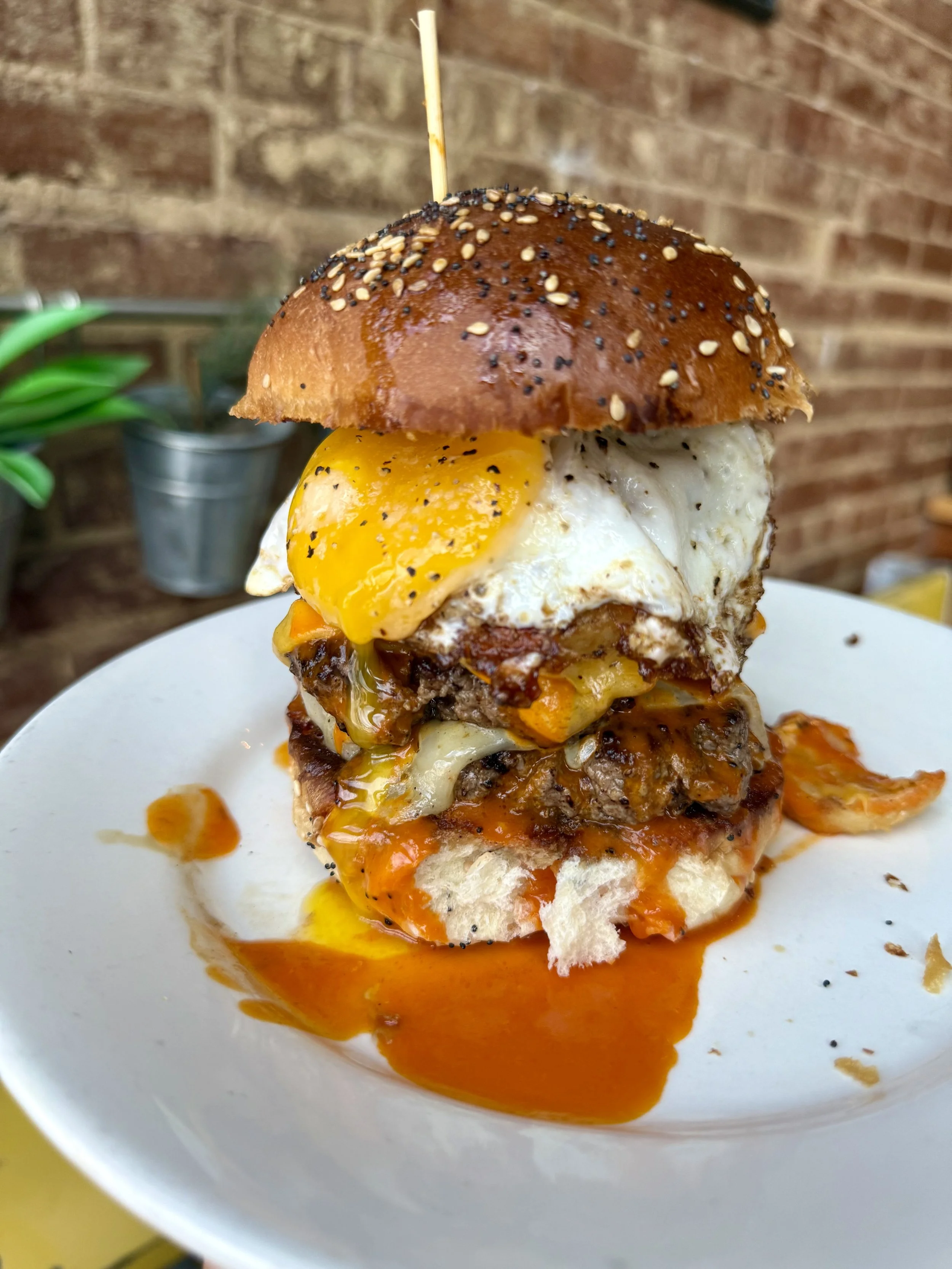 The Hulkster - Double beef patty, american cheese, pepperjack cheese, sidewinders, fried egg, hot sauce