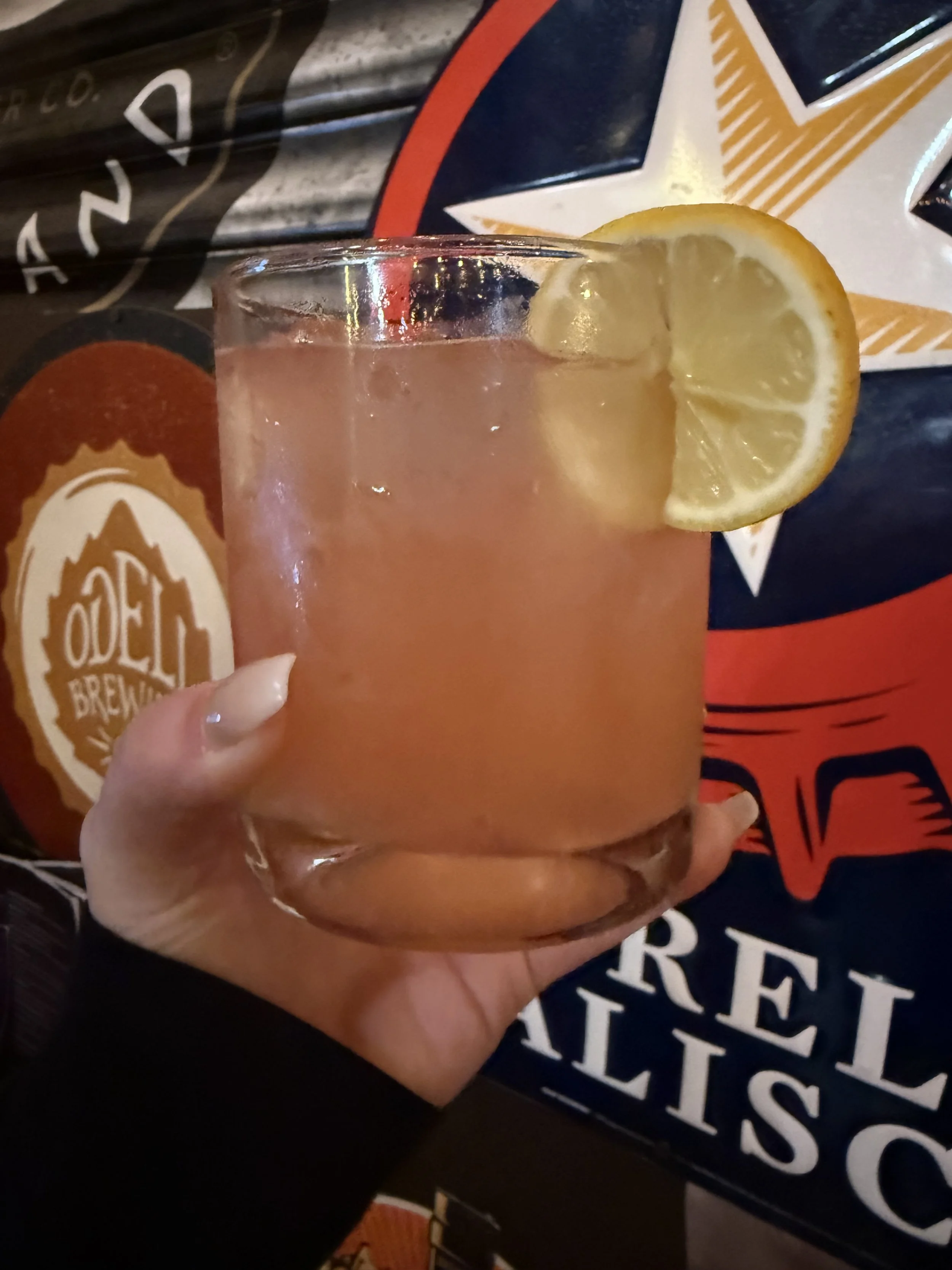 Flora Rosa: Flora Adora gin & orange bitters filled with grapefruit juice over ice