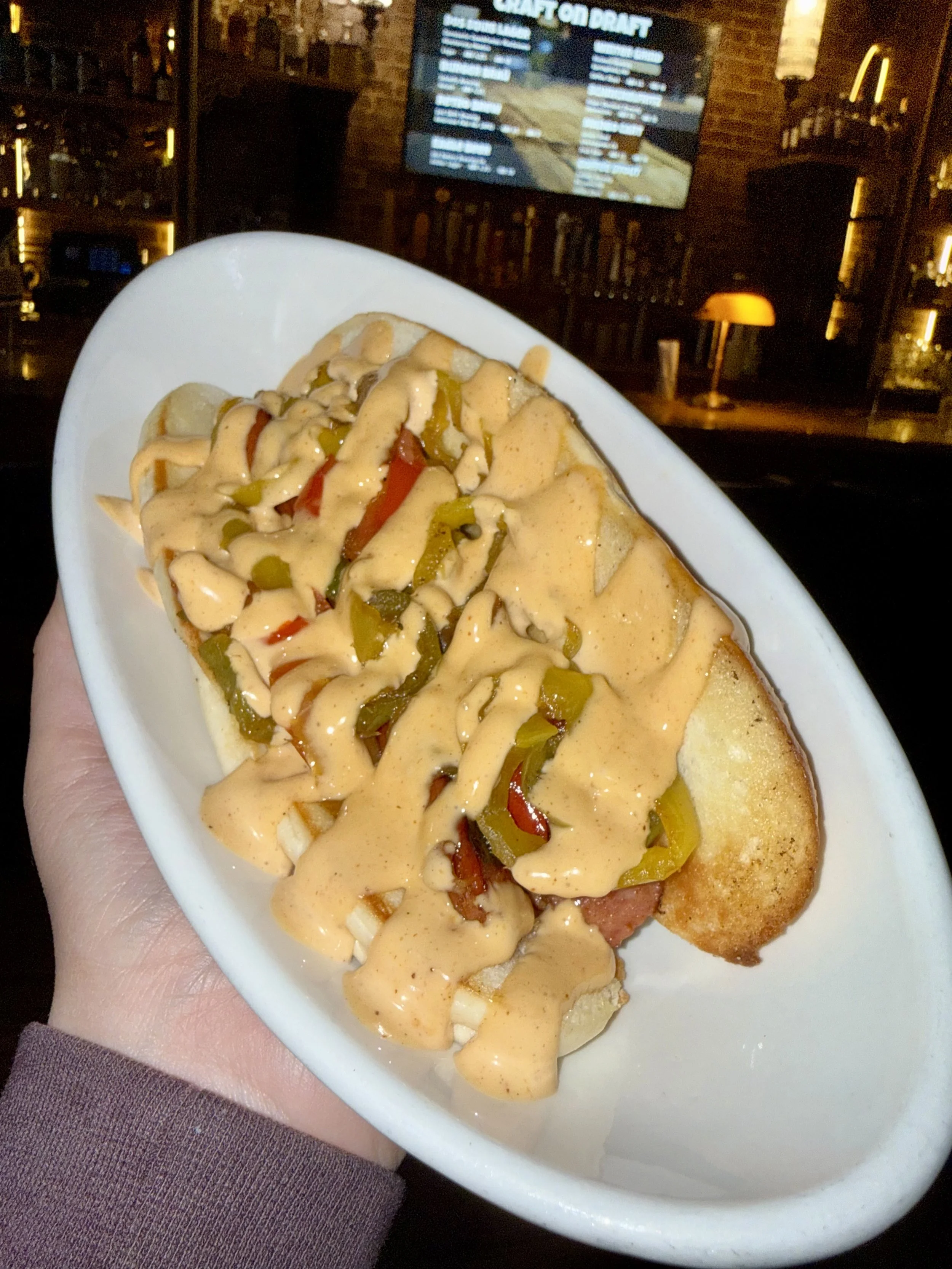 grilled andouille, red peppers, banana peppers, cheddar jack, sriracha mayo, toasted hoagie