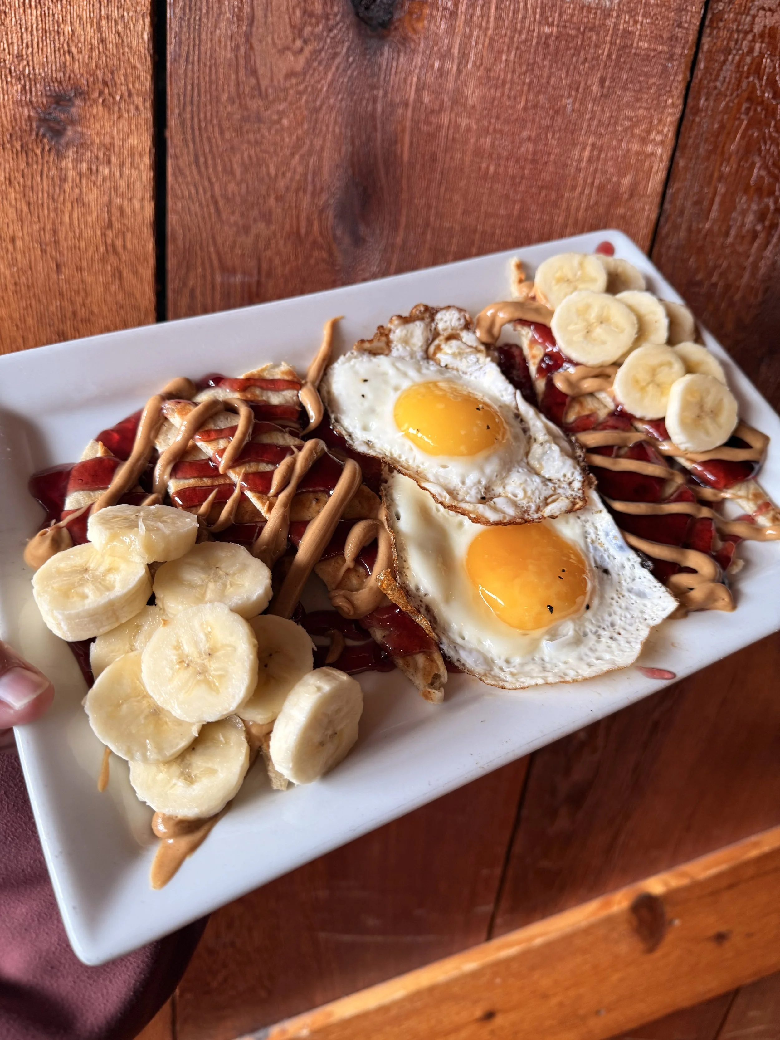 Brunch Feature: Peanut butter & jelly flatbread with banana slices and 2 sunny side eggs