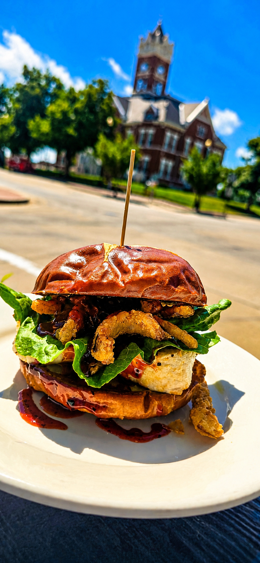 grilled chicken breast, romaine lettuce, crispy onion straws, maple blueberry bbq sauce, pretzel bun.