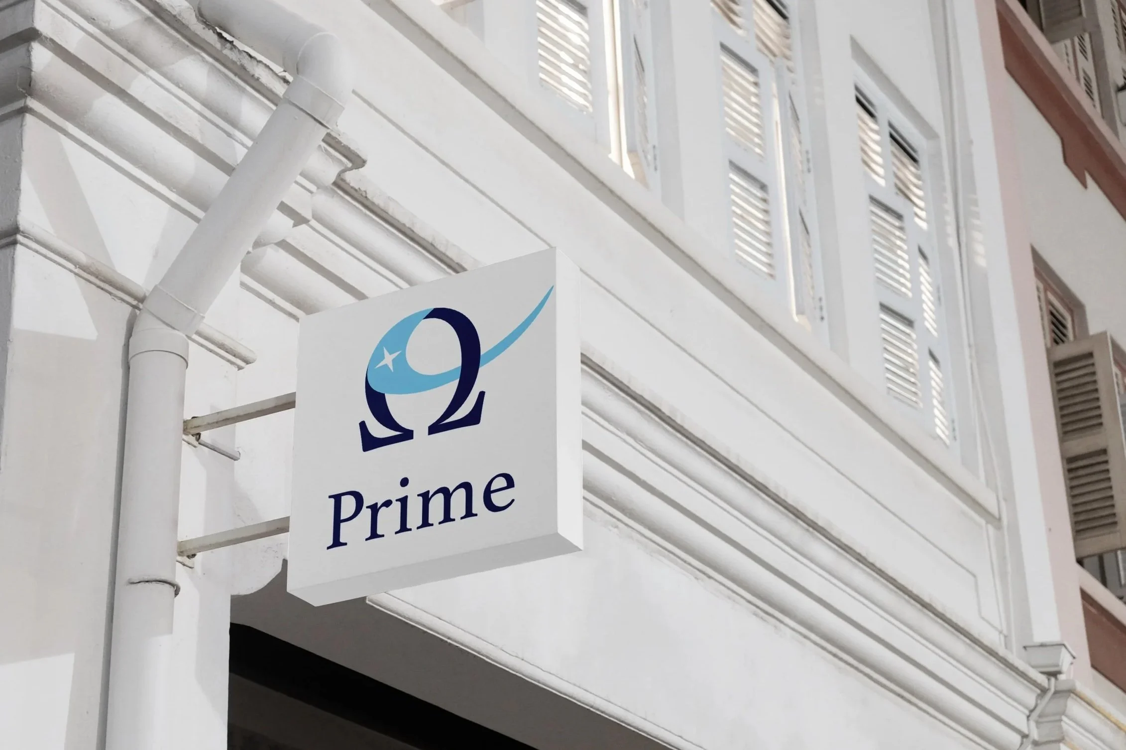 Full color logo mocked up on white rectangular sign on side of a white building