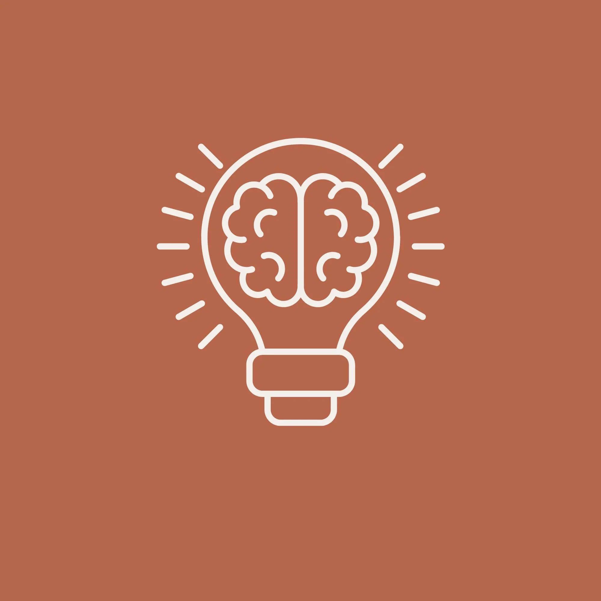 Line drawing of a light bulb with a brain in the center, radiating lines around it
