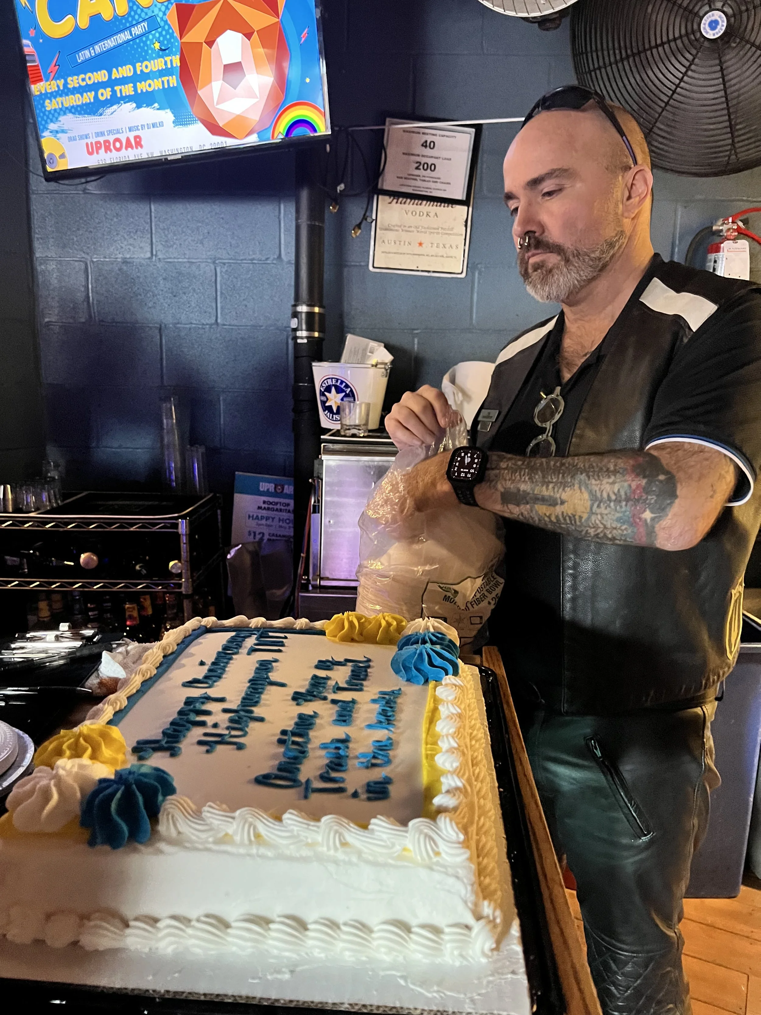 May 2025. Tim W. guarding the cake.