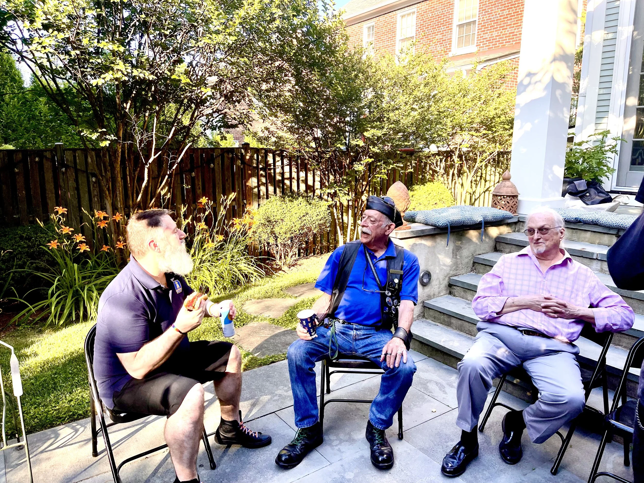 May 2024. Anniversary BBQ at Nicholas S.'s home. Nicholas S., Eric G., and David S.'s partner.