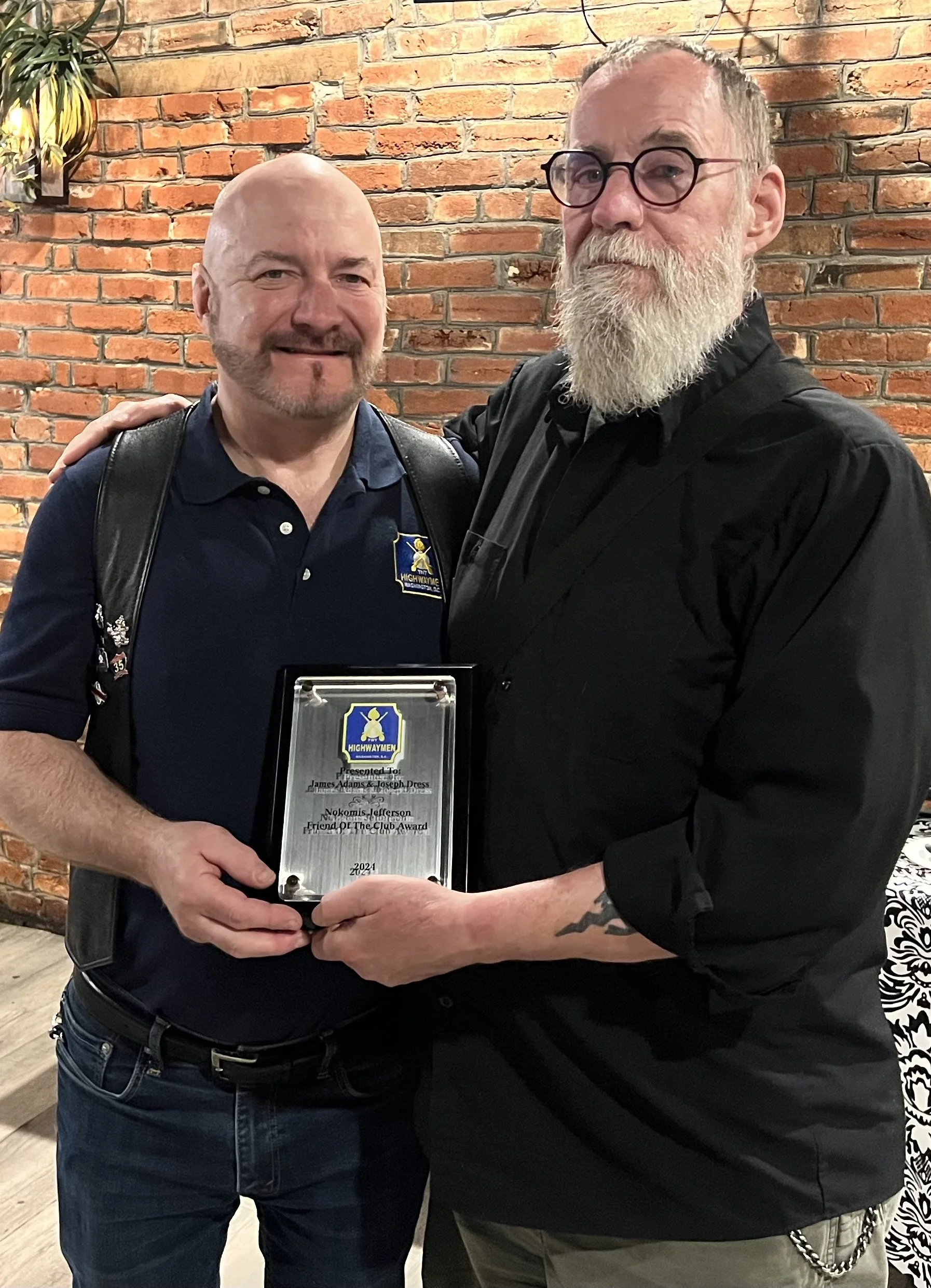 May 2025. Nelson B. presenting the "Nokomis Jefferson Friend of the Club Award" to James Adams and Joseph Dress.