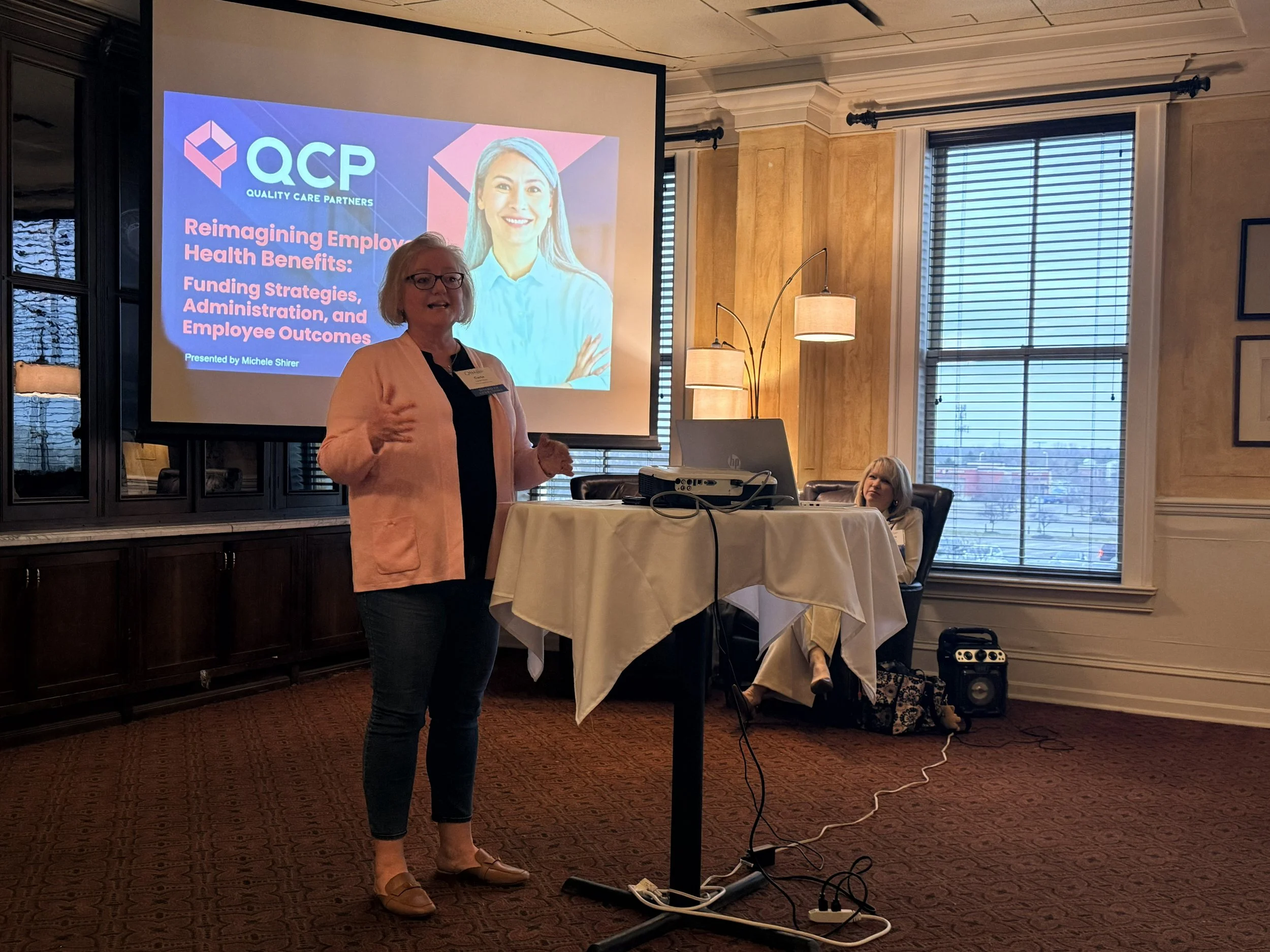 NABIP Columbus Board Member Carla Poston introduces Michele Shirer