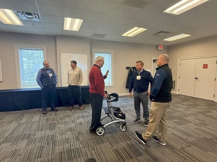 Attendees networking with one another