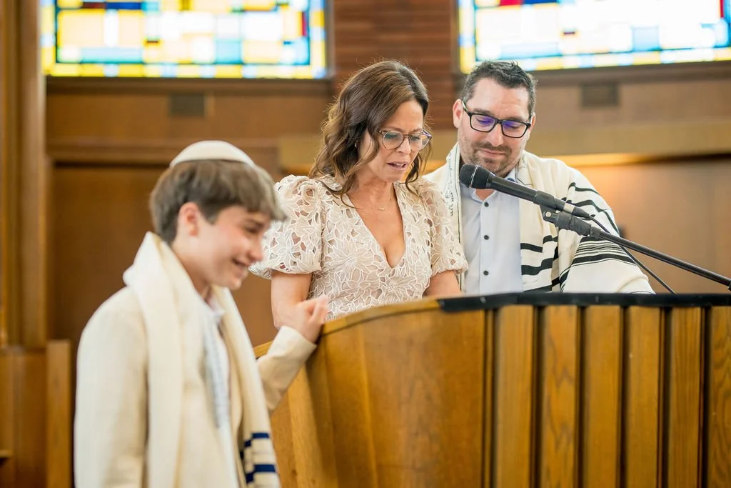 A couple giving a speech during a Montreal Bar Mitzvah