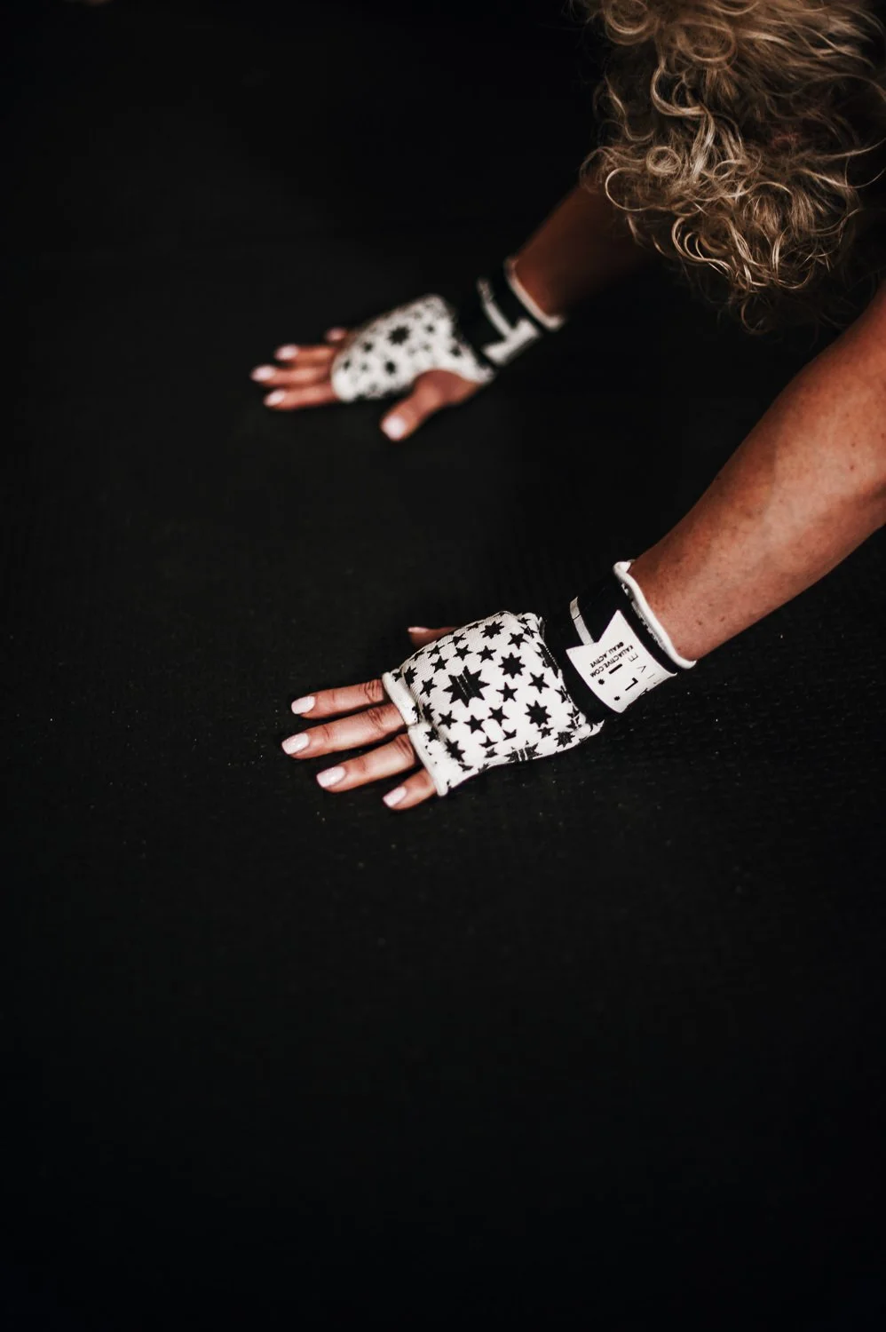 Lifestyle photograph of Kali Active hand wraps at Beautifully Savage boutique boxing gym in Fort Collins, Colorado
