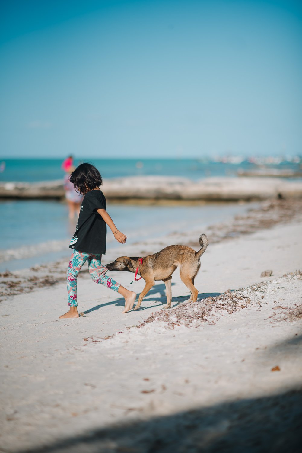 Ryan-Waneka-Photography-Travel-2021-Isla-Holbox-Mexico-1-Coppertone-girl-real-life.jpg
