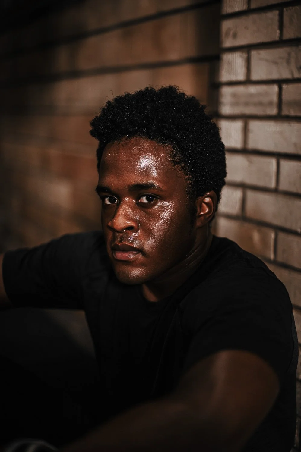 Dramatic portrait of an athlete at Beautifully Savage boutique boxing gym in Fort Collins, Colorado
