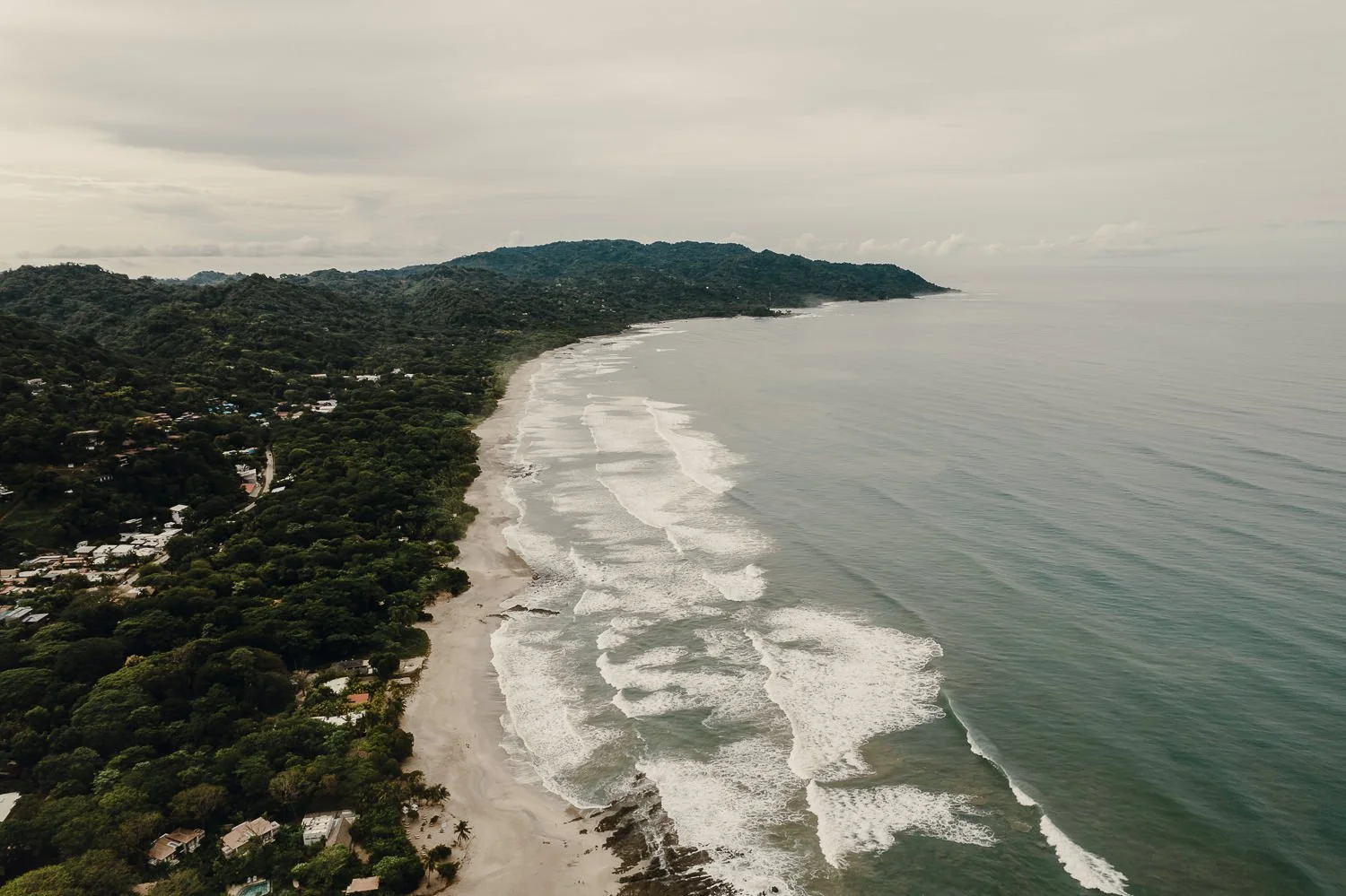 Drone travel photography of the beach shore in Santa Teresa, Costa Rica