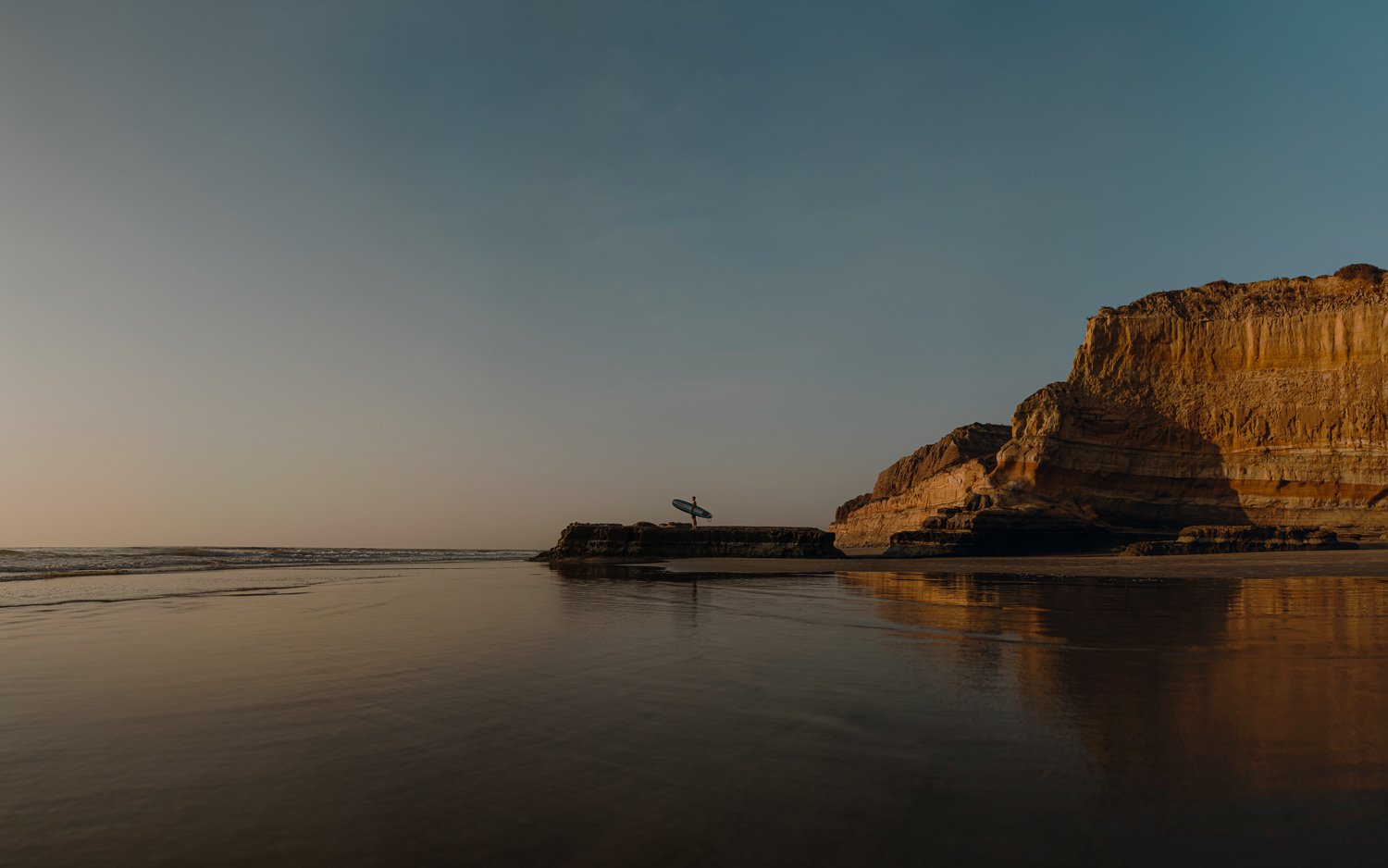 Professional adventure photography in San Diego, California - surfing portrait near blacks beach