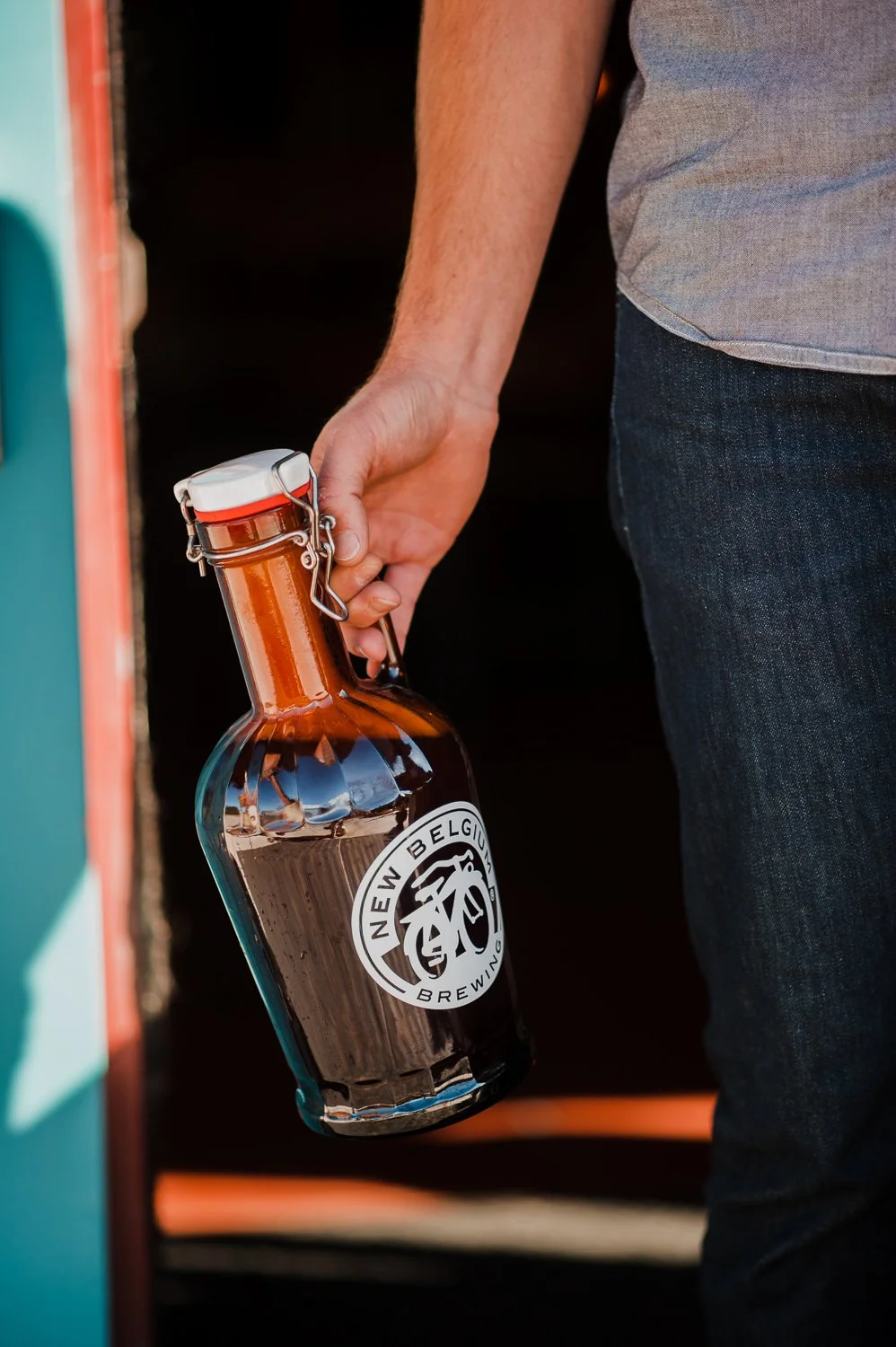 Brand Photography of New Belgium Brewing Company - beer growler glass bottle