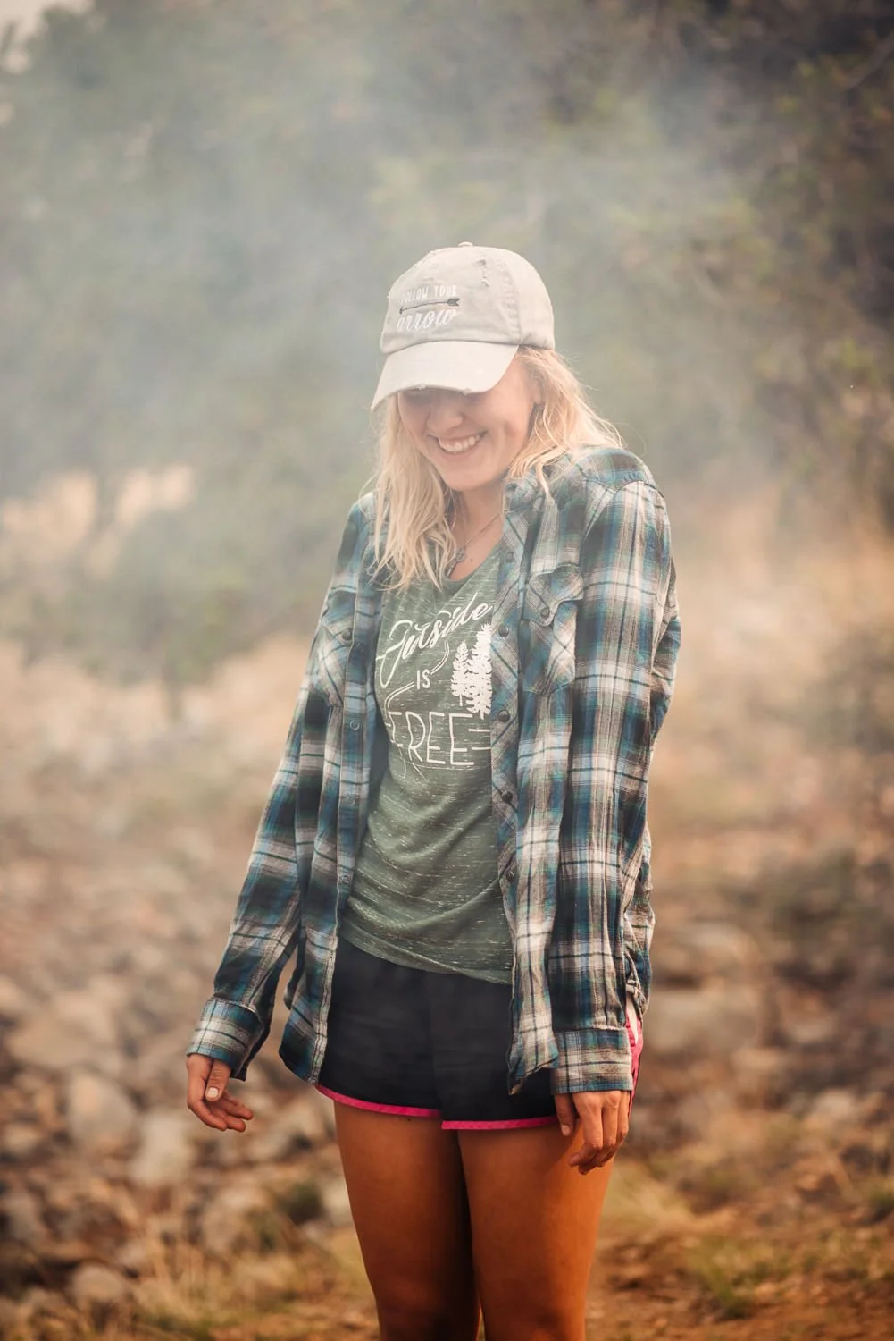 Adventure lifestyle product photography of a blonde girl camping near Great Sand Dunes National Park in Colorado for Akinz Boardwear