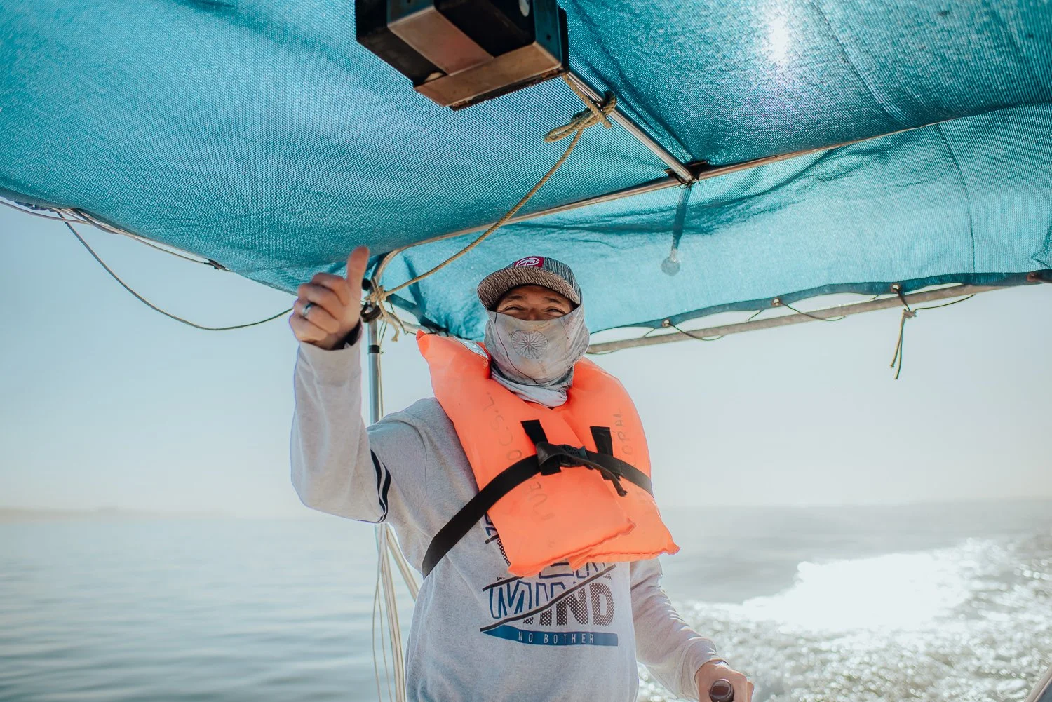 Lifestyle travel portrait photography of a boat driver in Cabo San Lucas, Mexico