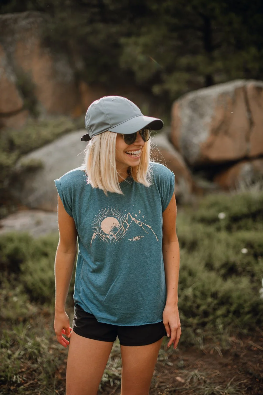Adventure lifestyle photography of a cute blonde girl camping in Northern Colorado for Akinz Boardwear