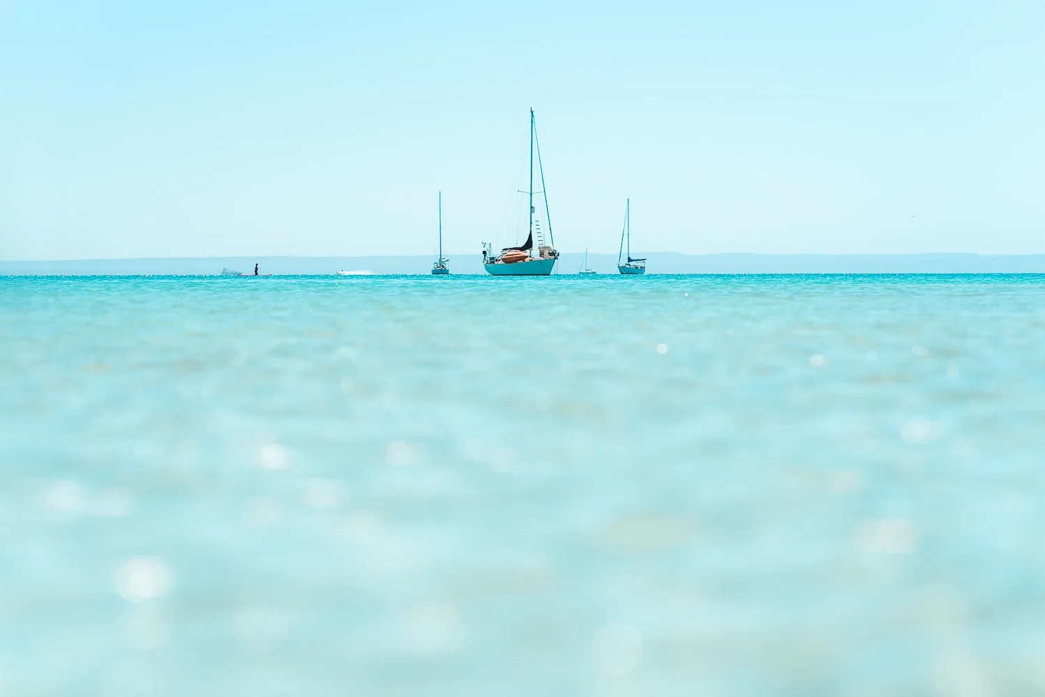 Ryan-Waneka-Photography-2022-La-Paz-Mexico-29-three-sailboats-clear-aqua-water-playa-pichilingue.jpg
