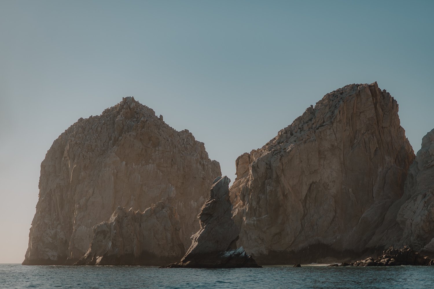 Landscape photography of the unique rock formations at Lover's Beach in Cabo San Lucas, Mexico