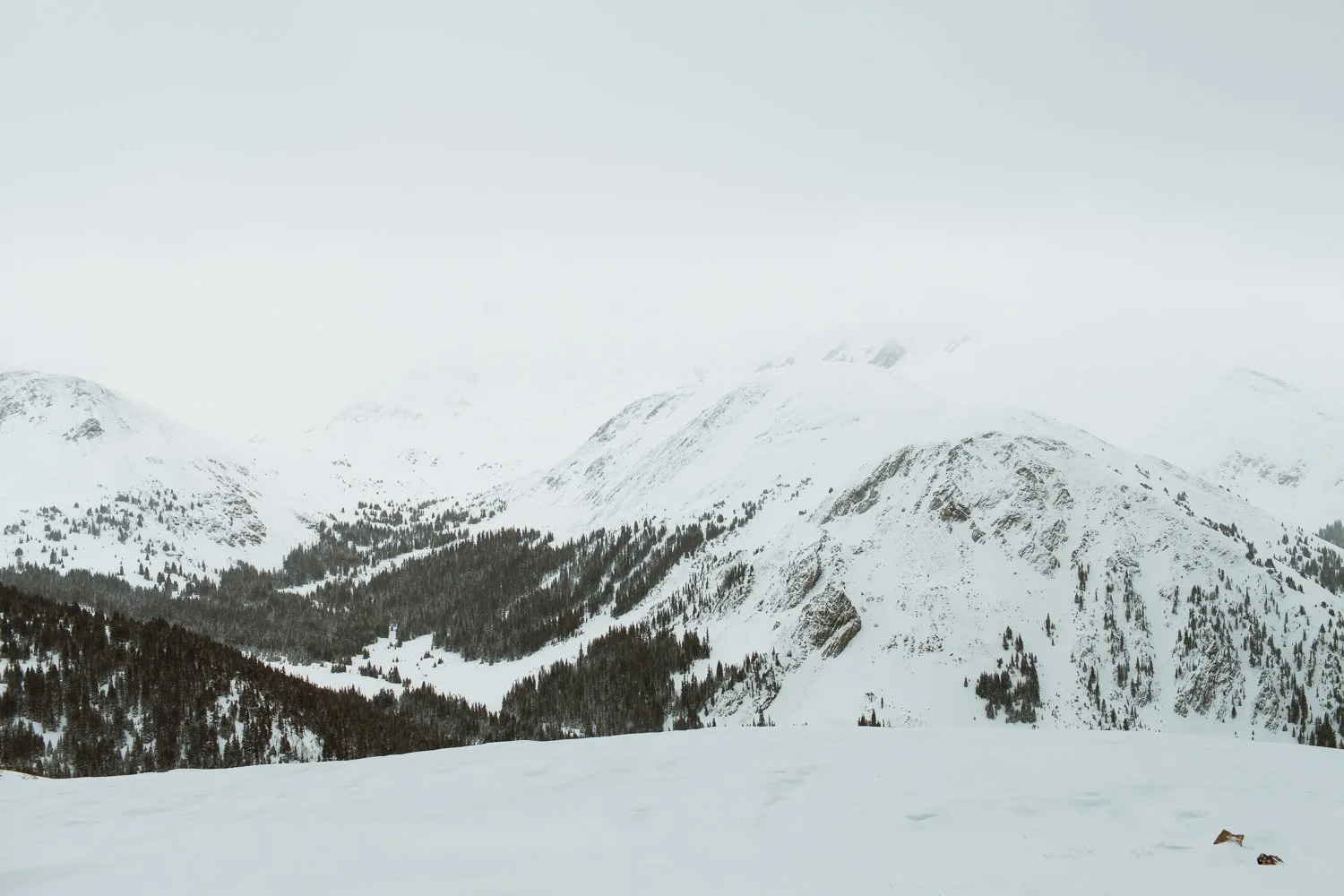 Snowy mountain landscape photography near Breckenridge, Colorado - snowshoeing winter hut trip