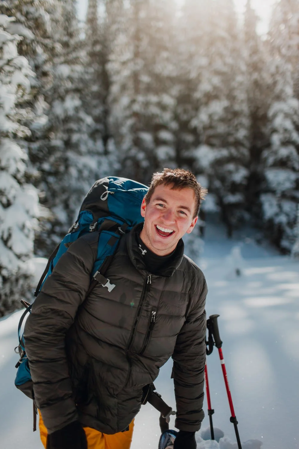 Adventure portrait photography near Breckenridge, Colorado - snowshoeing winter hut trip