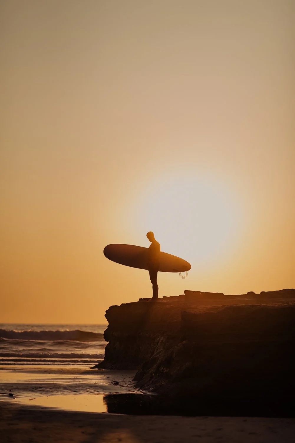 Professional adventure photography in San Diego, California - surfing portrait near blacks beach