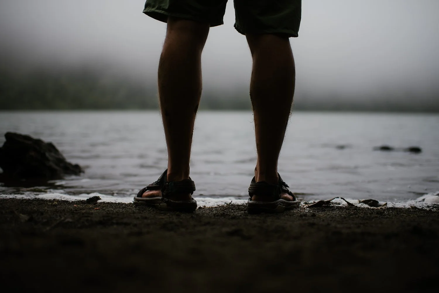 Landscape photograph of the foggy lake at the top of Cerro Chato in Costa Rica