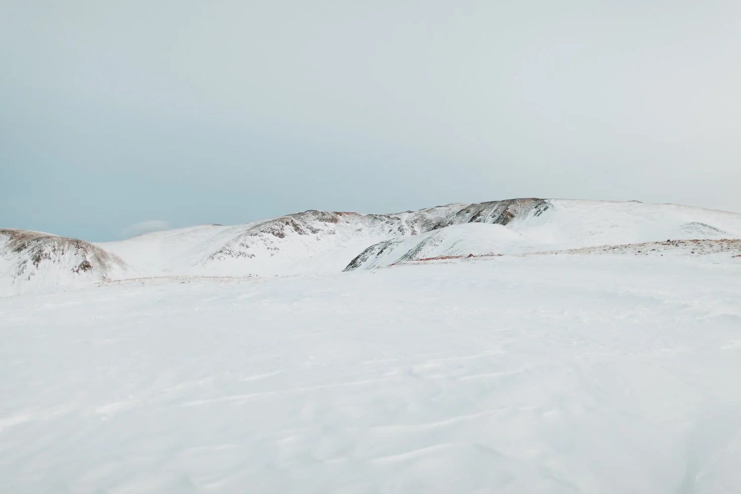 Snowy mountain landscape photography near Breckenridge, Colorado - snowshoeing winter hut trip