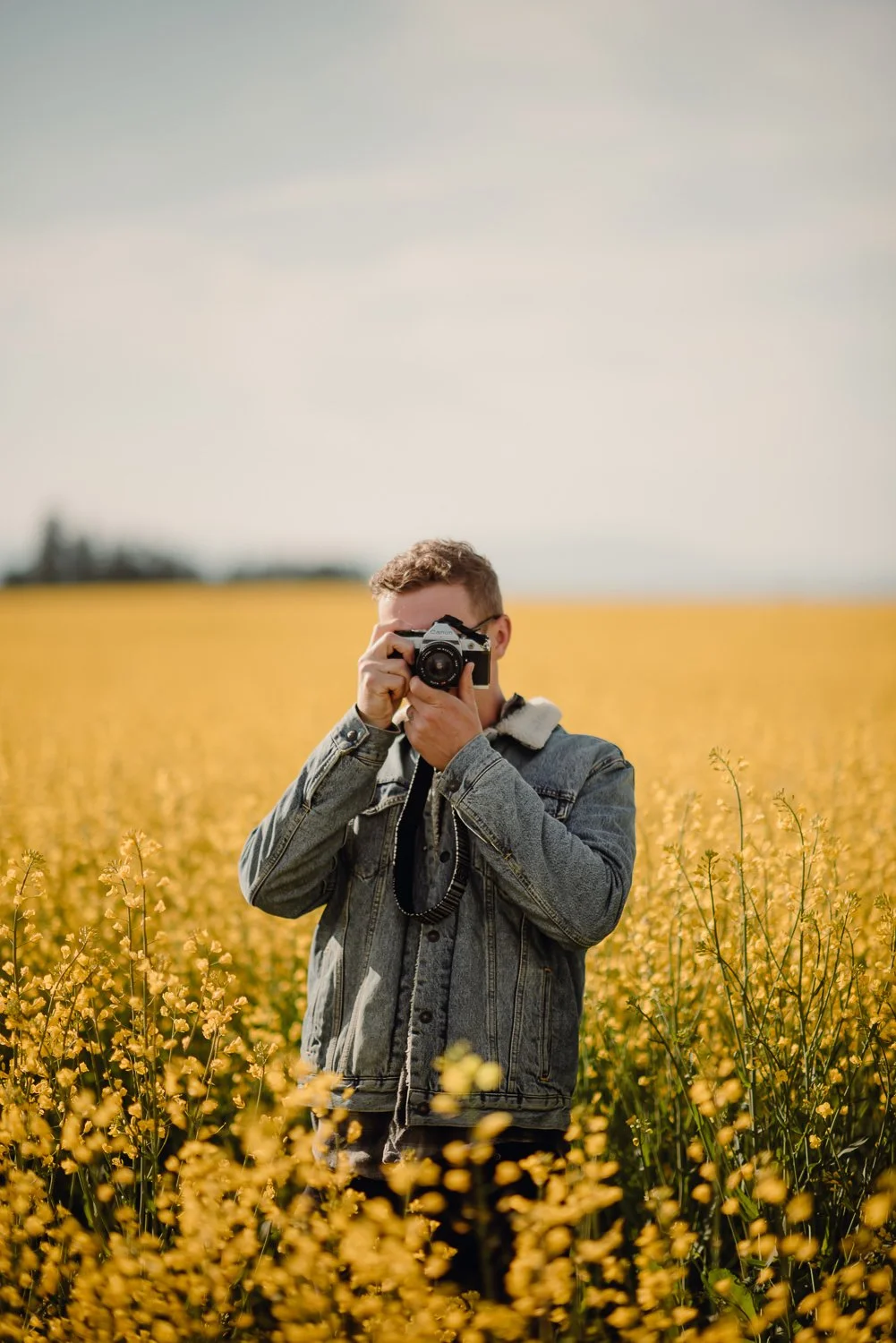 Professional adventure photography in Spokane, Washington - lifestyle portrait Canola flower fields