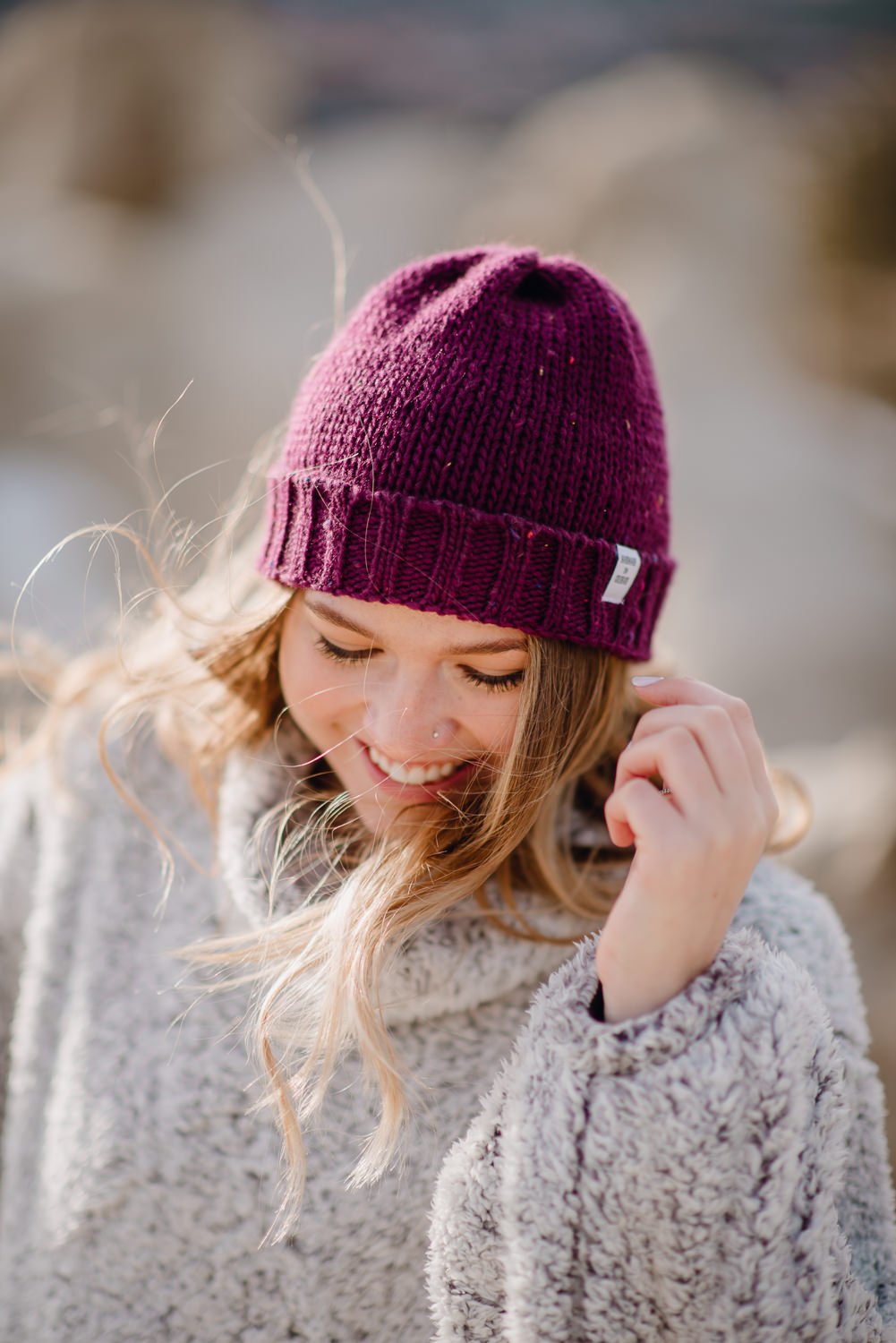 Lifestyle photography of young girl wearing a purple beanie in Colorado Springs, Colorado for Akinz Boardwear