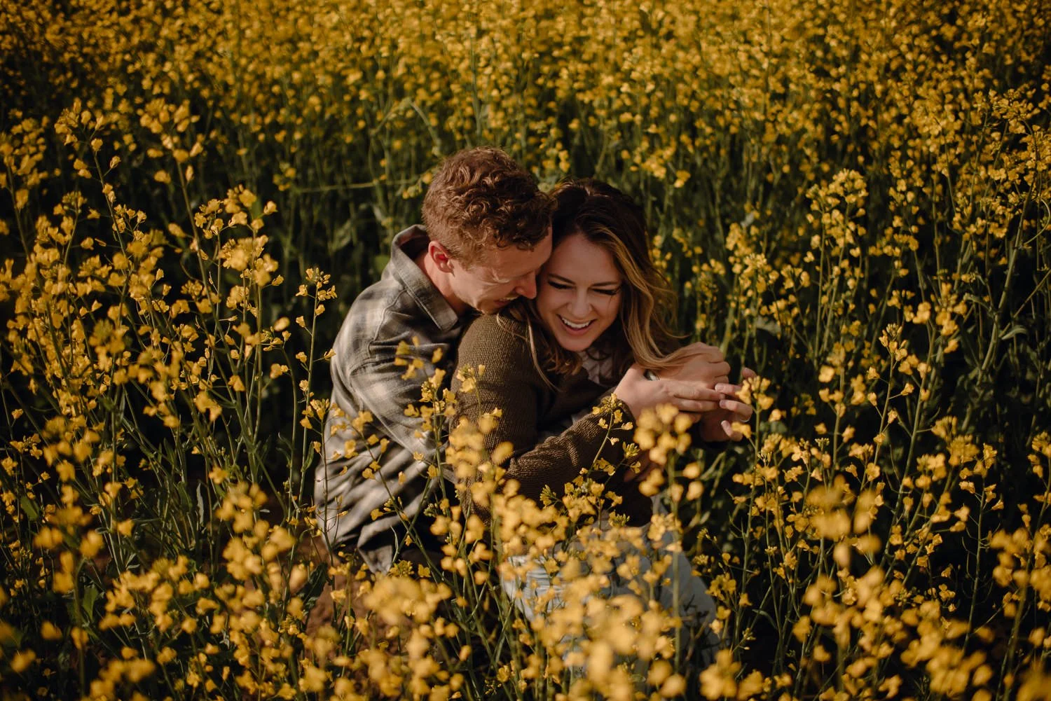 Professional adventure photography in Spokane, Washington - lifestyle portrait Canola flower fields